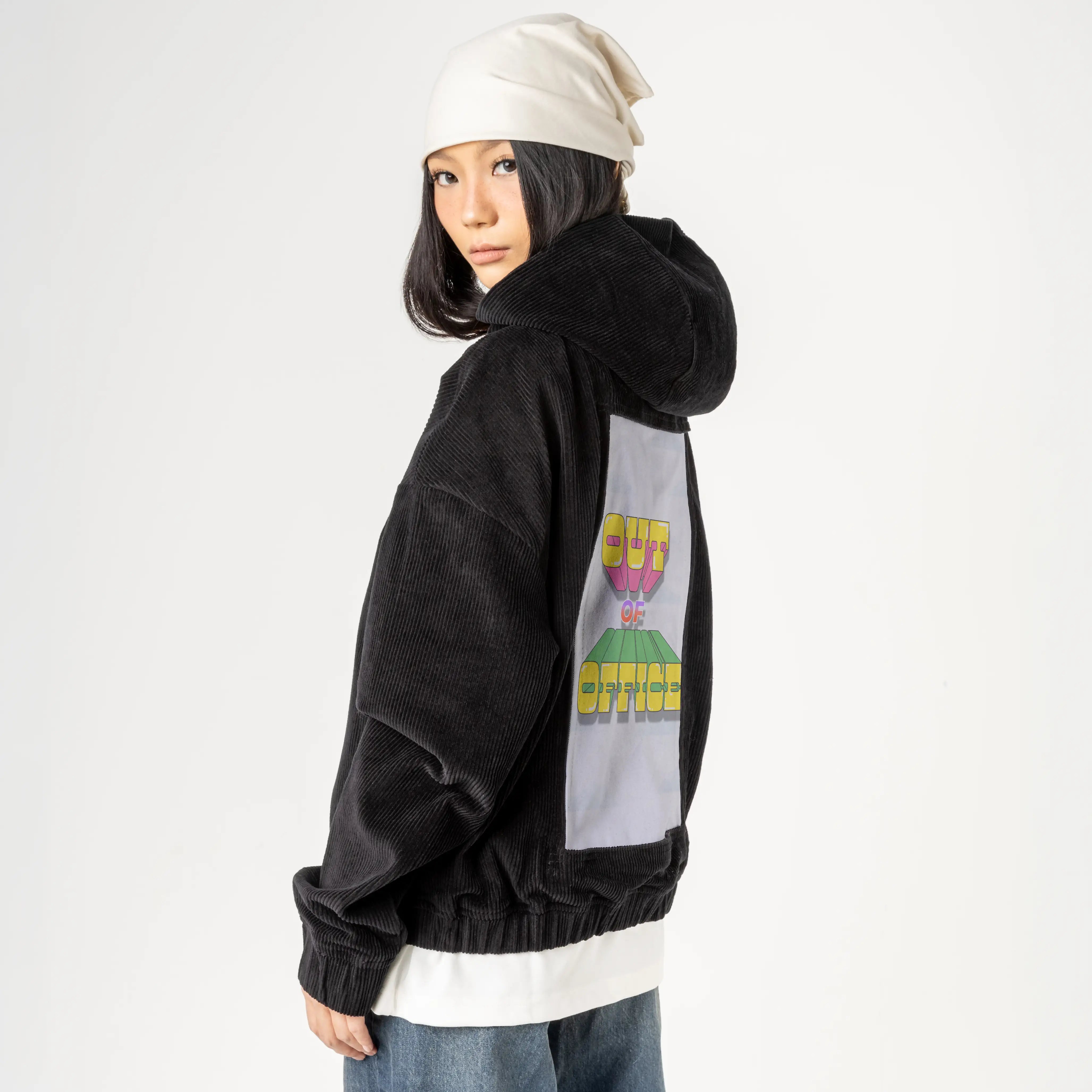 outofoffice patch on female retro cord hoodie in onyx