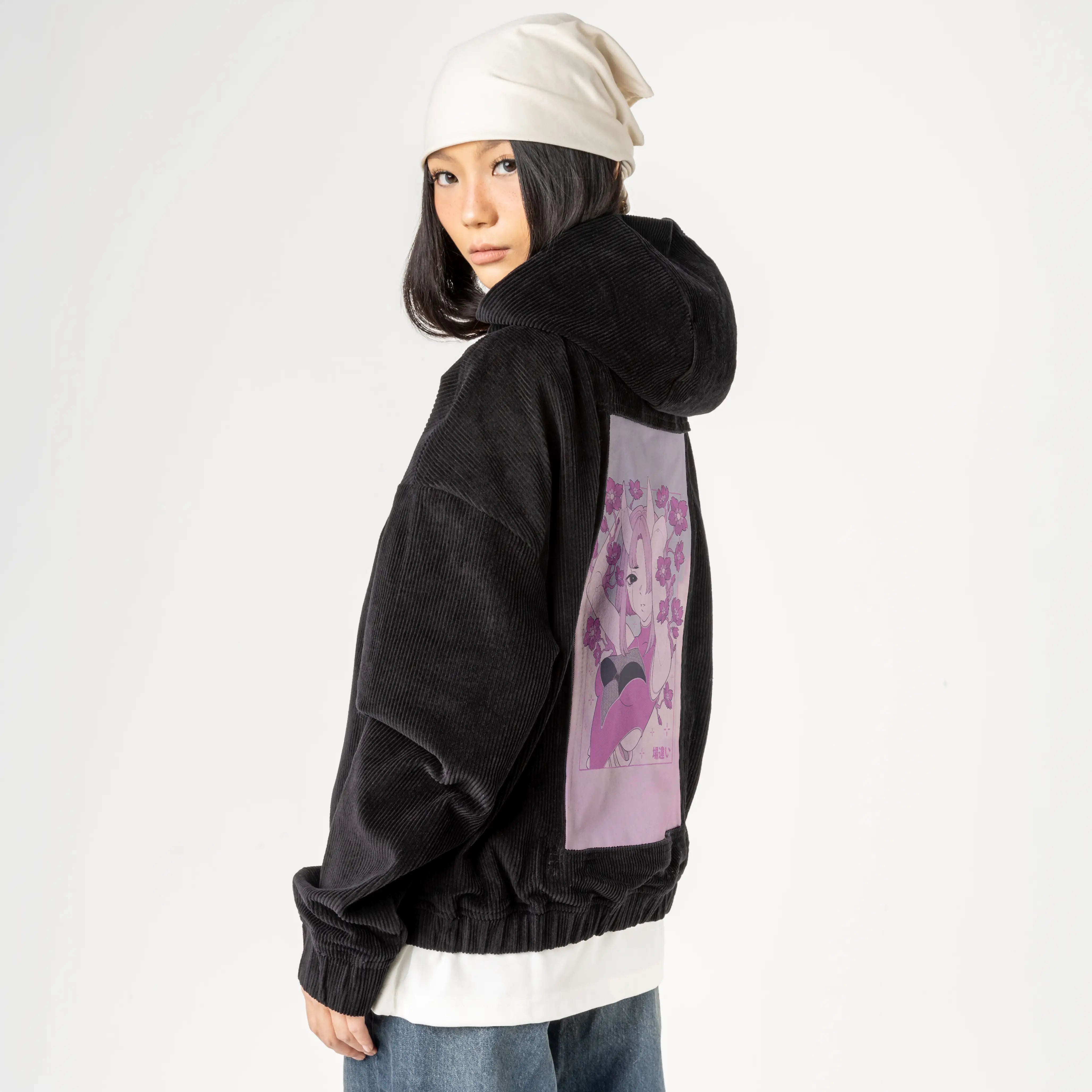 outofplace patch on female retro cord hoodie in onyx