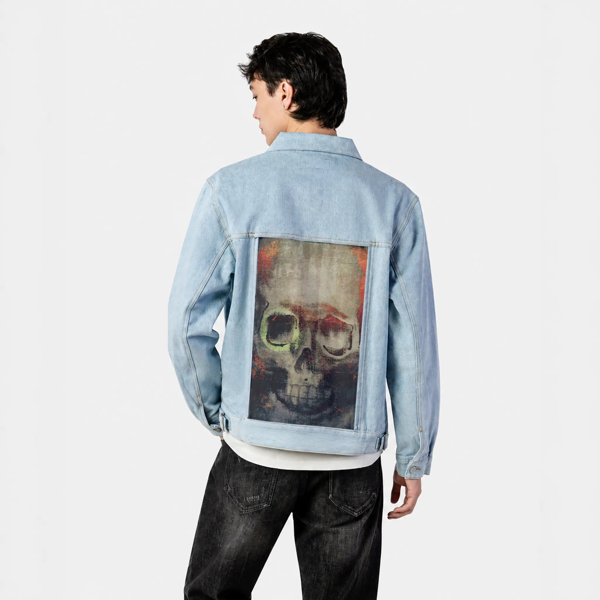 paintedskull patch on male og denim jacket in oceanside