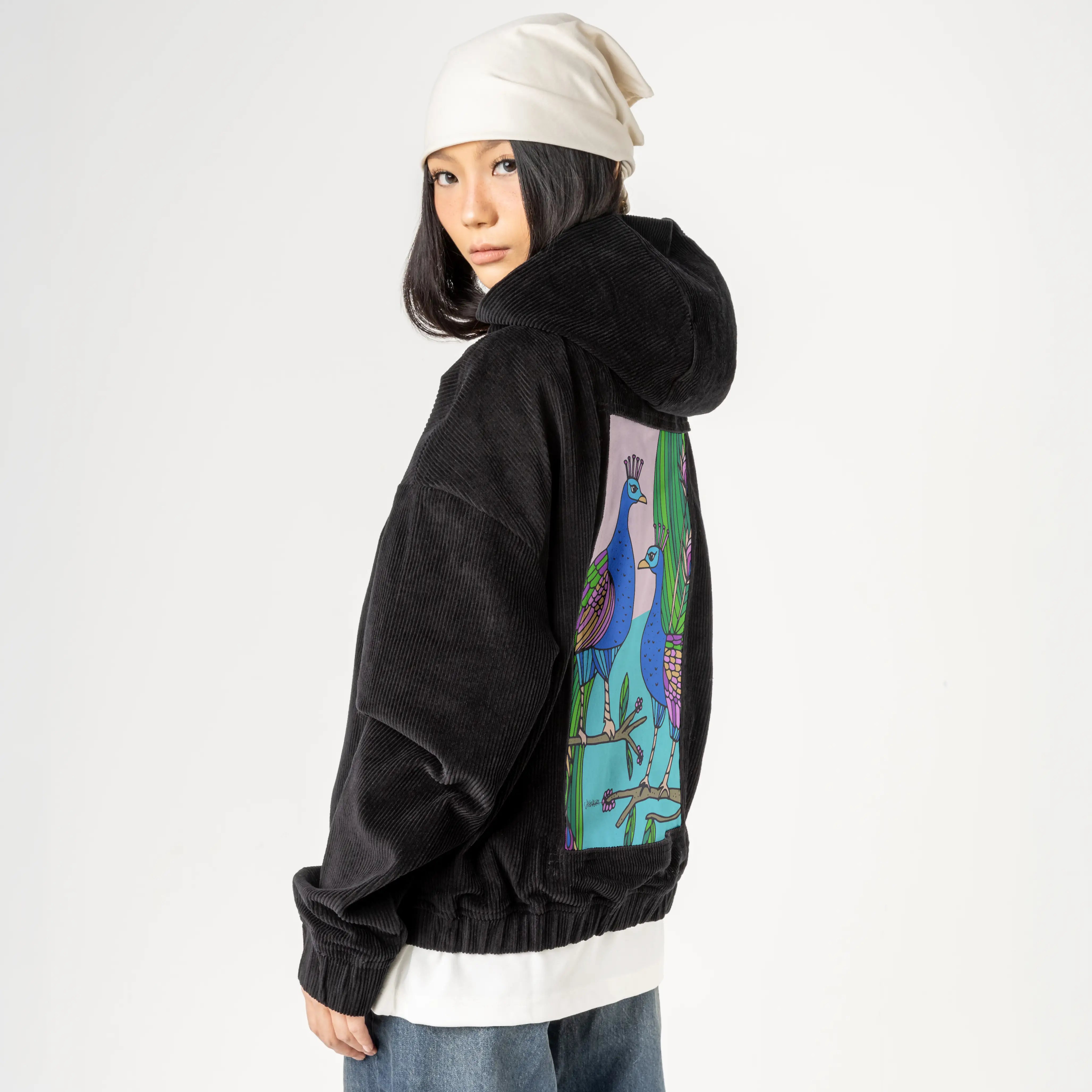 peacocks patch on female retro cord hoodie in onyx