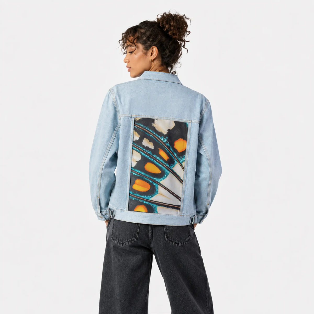 petallation patch on female og denim jacket in oceanside