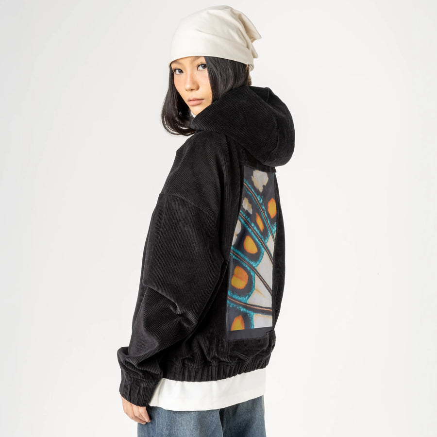 petallation patch on female retro cord hoodie in onyx