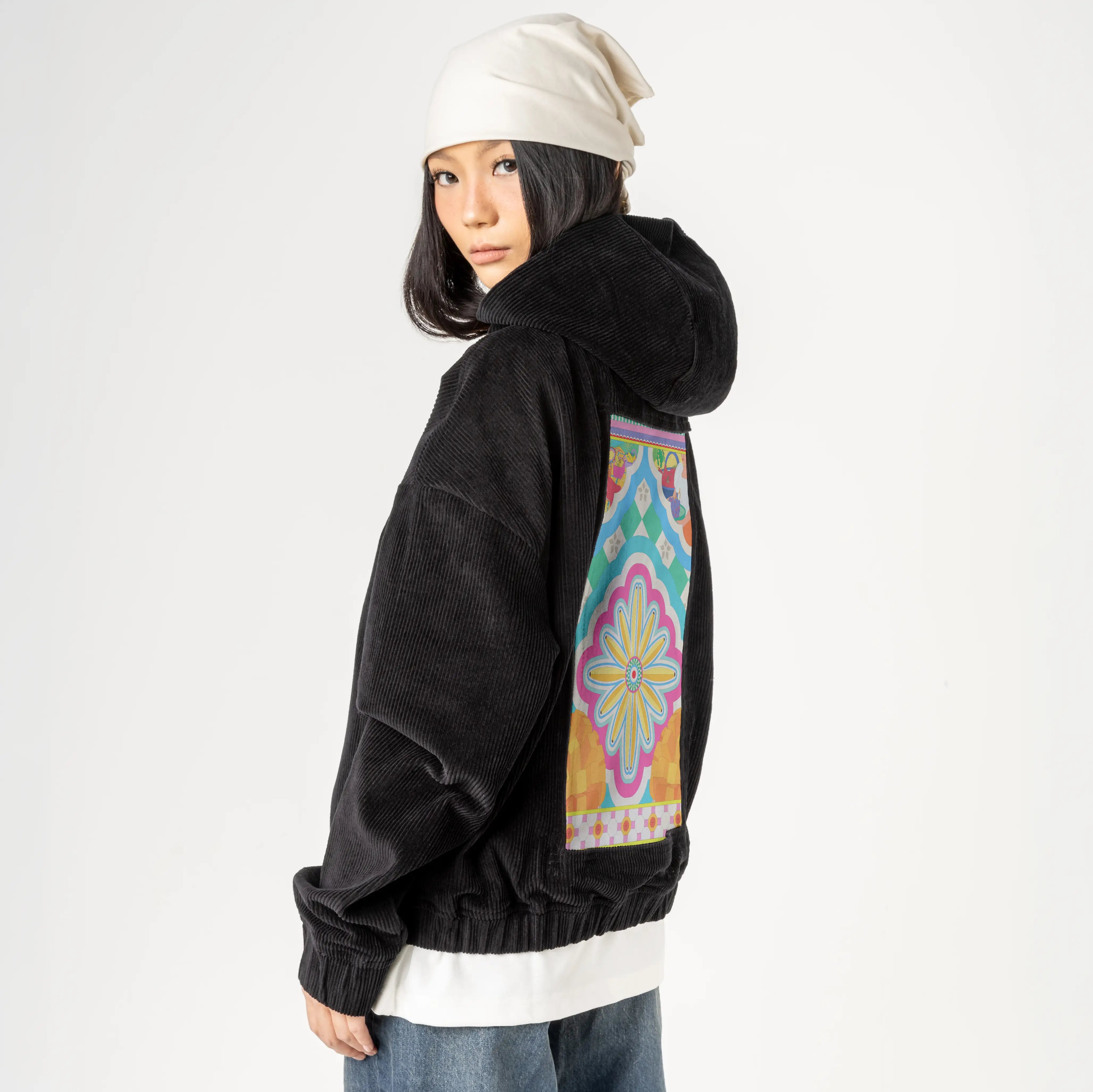 prutas patch on female retro cord hoodie in onyx