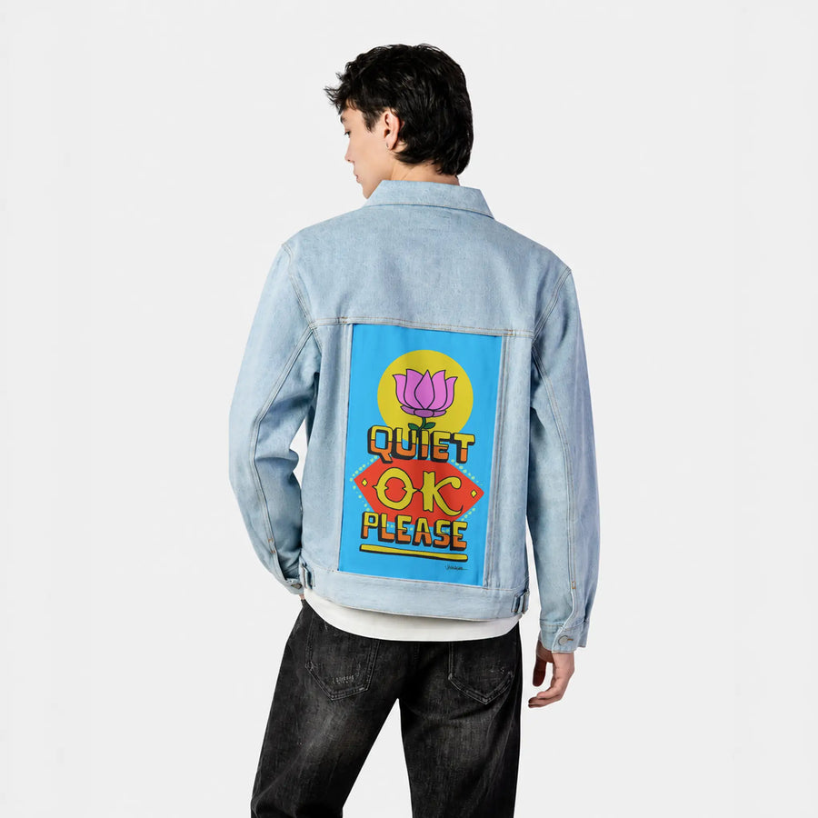 quietokplease patch on male og denim jacket in oceanside