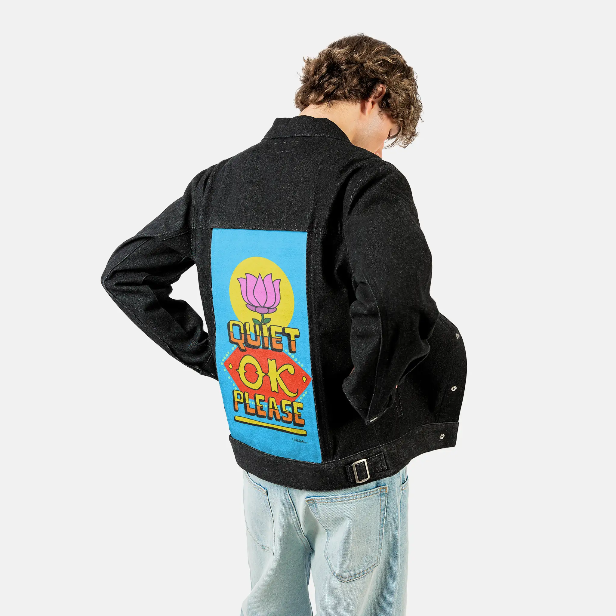 quietokplease patch on male og denim jacket in raven