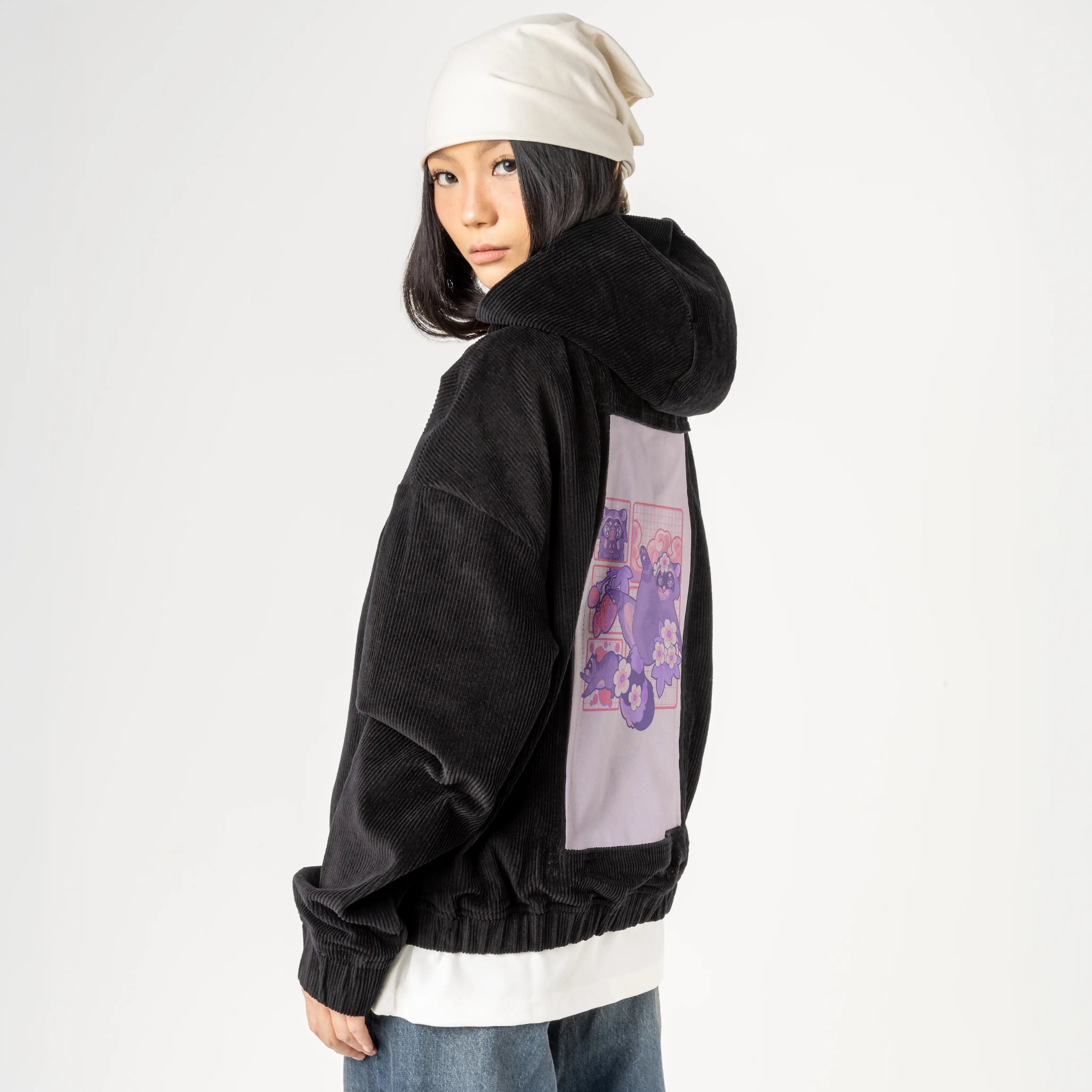 raccoon patch on female retro cord hoodie in onyx