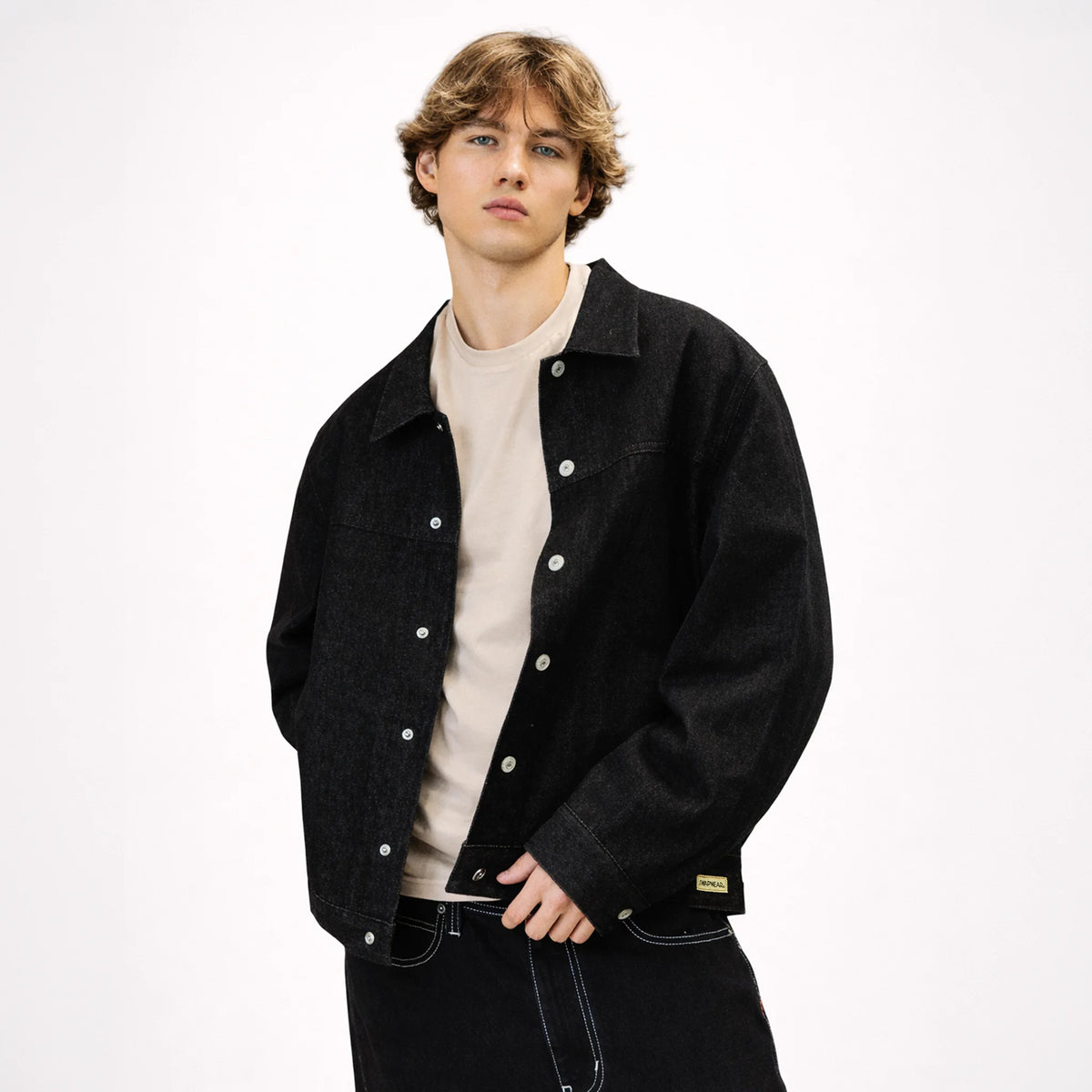 Nick (6'1) is wearing L for an oversize look.