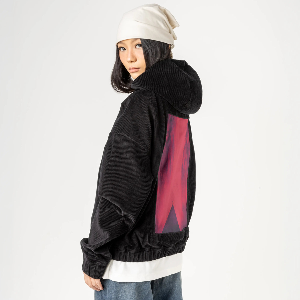reddream patch on female retro cord hoodie in onyx