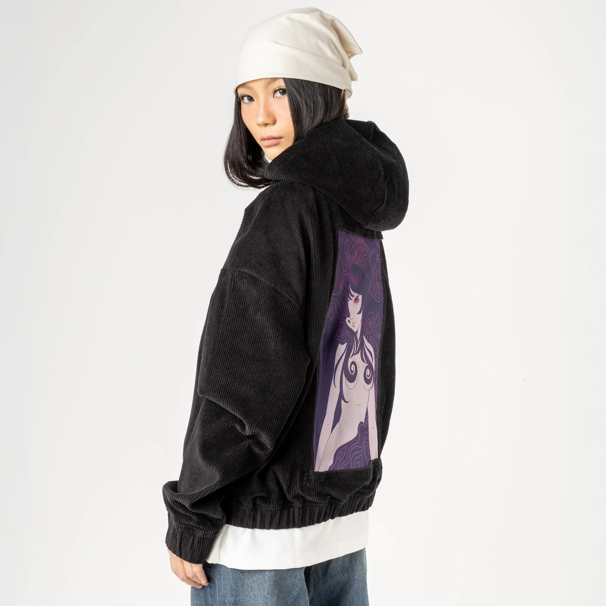 regret patch on female retro cord hoodie in onyx