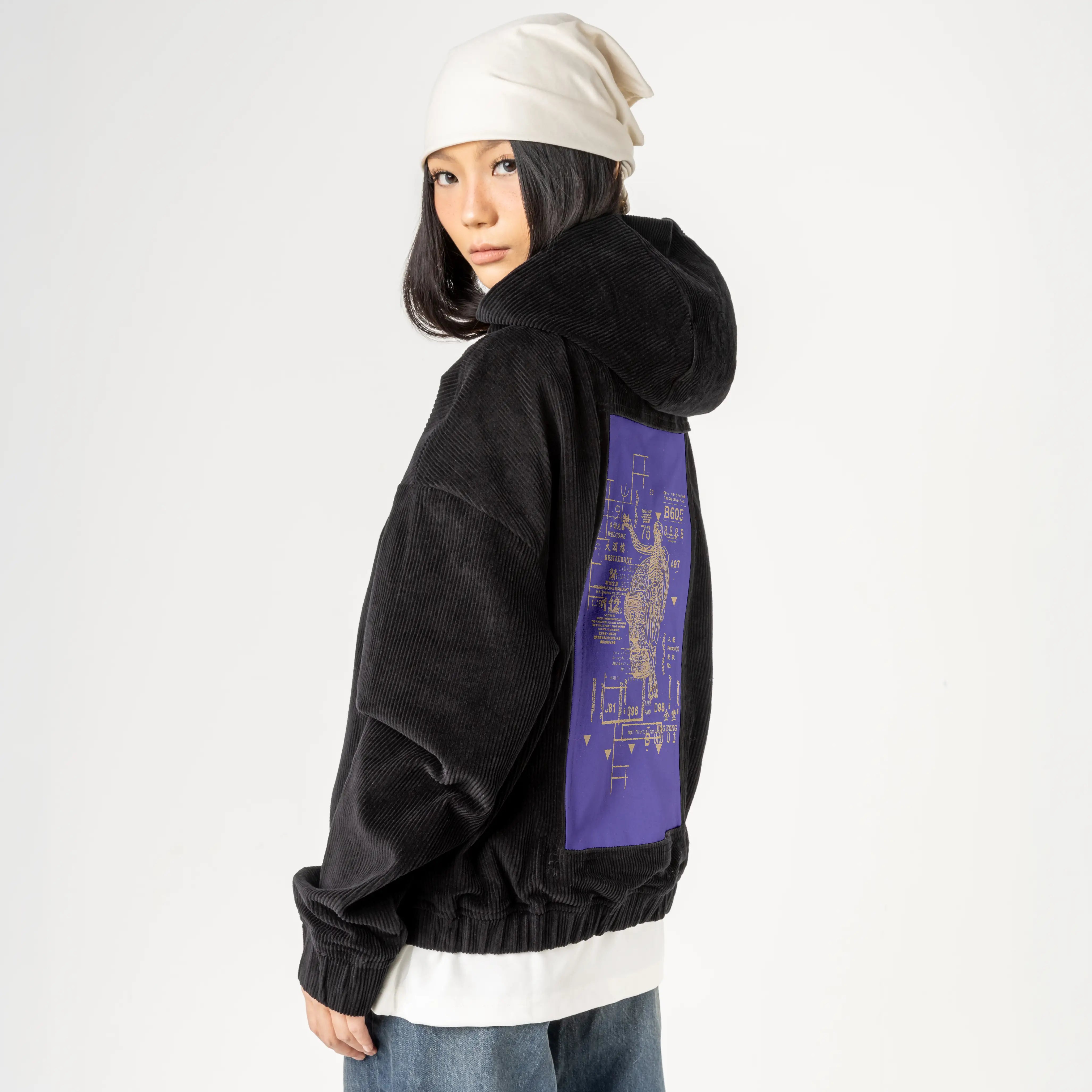 restaurant patch on female retro cord hoodie in onyx