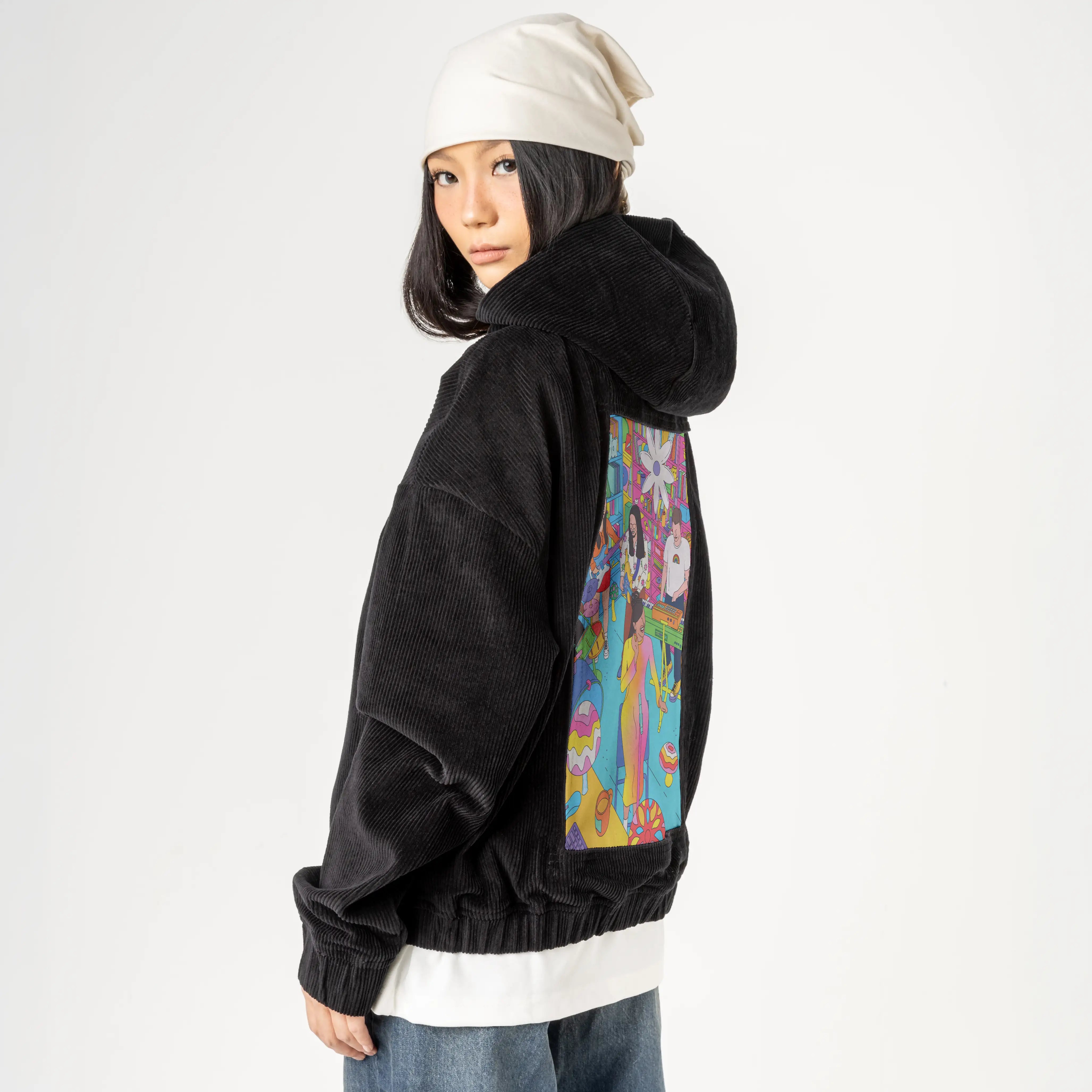 reveenatinydesk patch on female retro cord hoodie in onyx