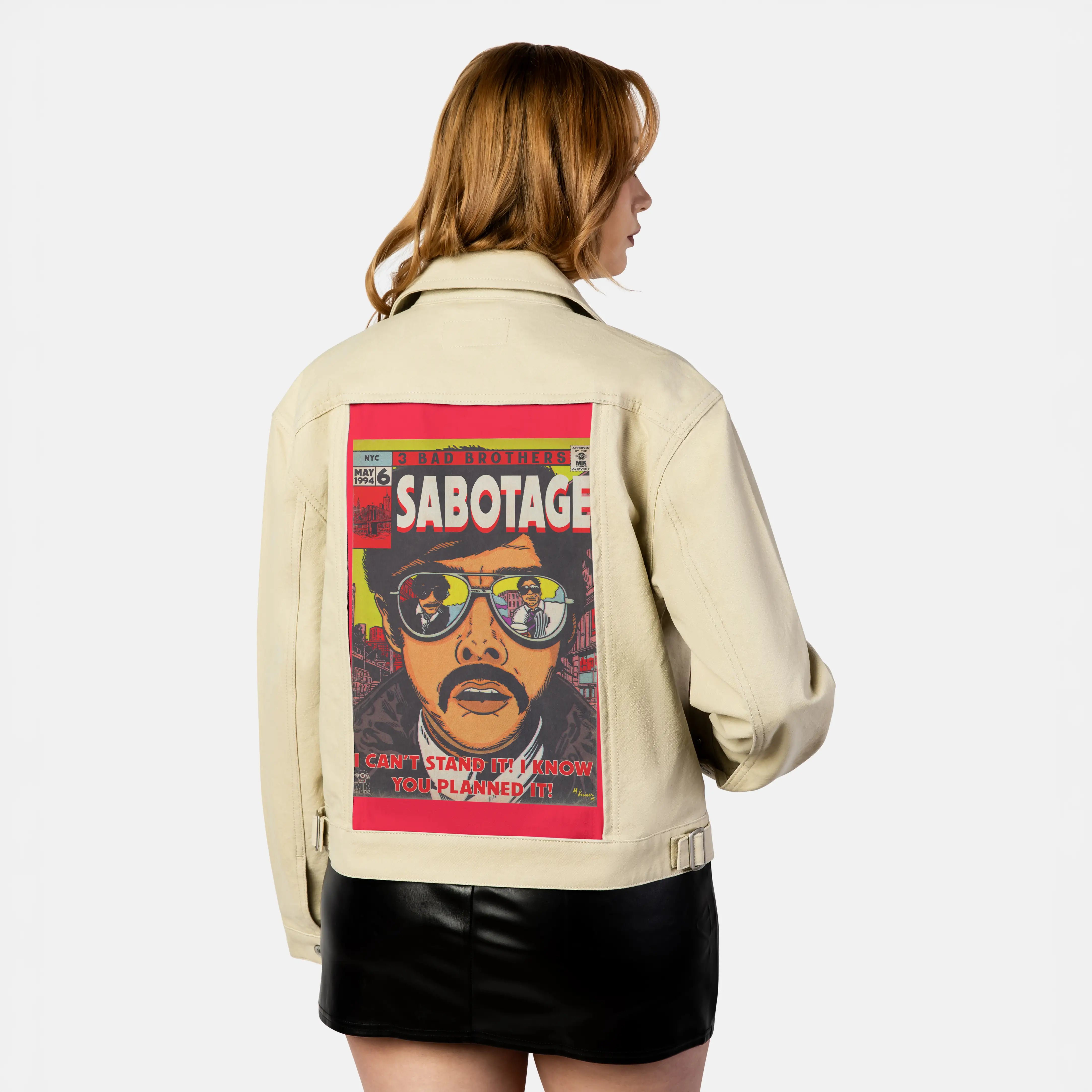 sabotage patch on female atelier canvas jacket in tan