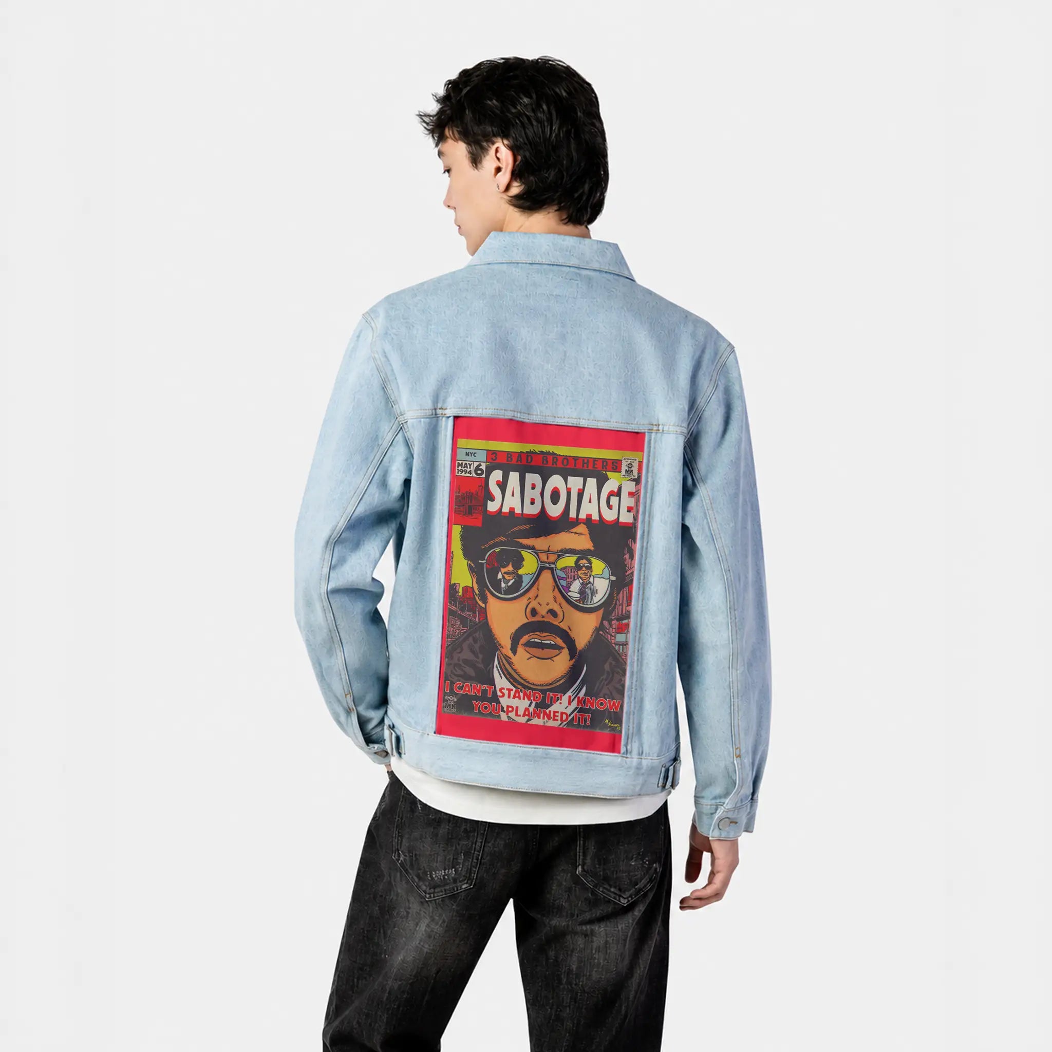 sabotage patch on male og denim jacket in oceanside
