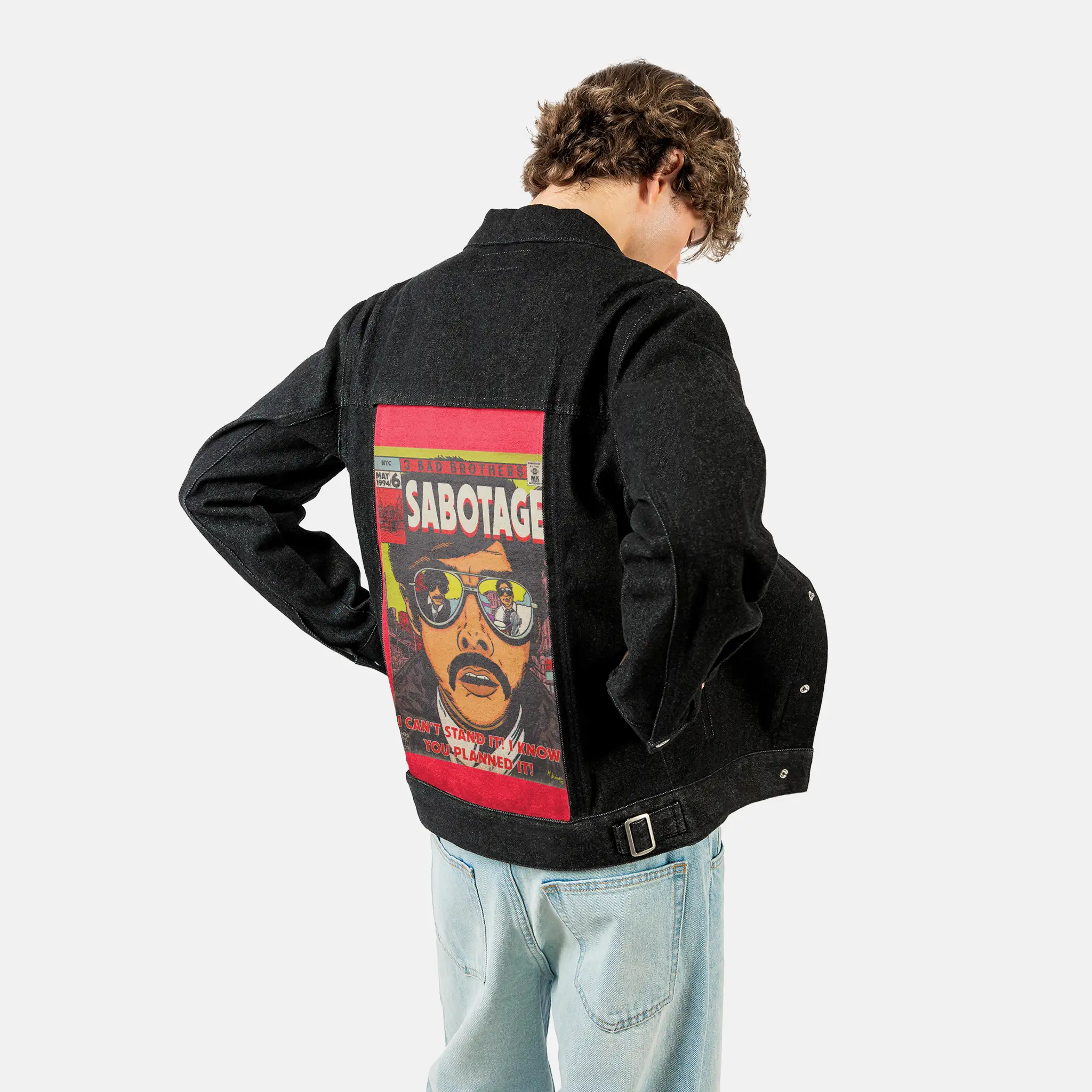 sabotage patch on male og denim jacket in raven