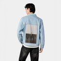 sacredunion patch on male og denim jacket in oceanside