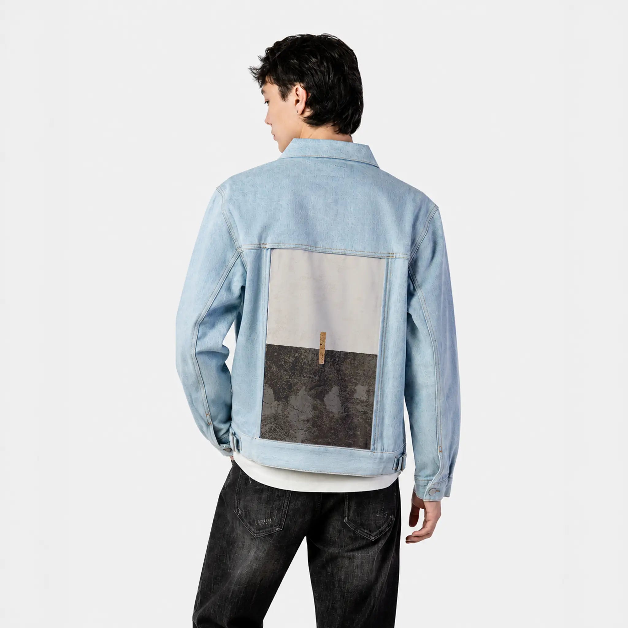 sacredunion patch on male og denim jacket in oceanside