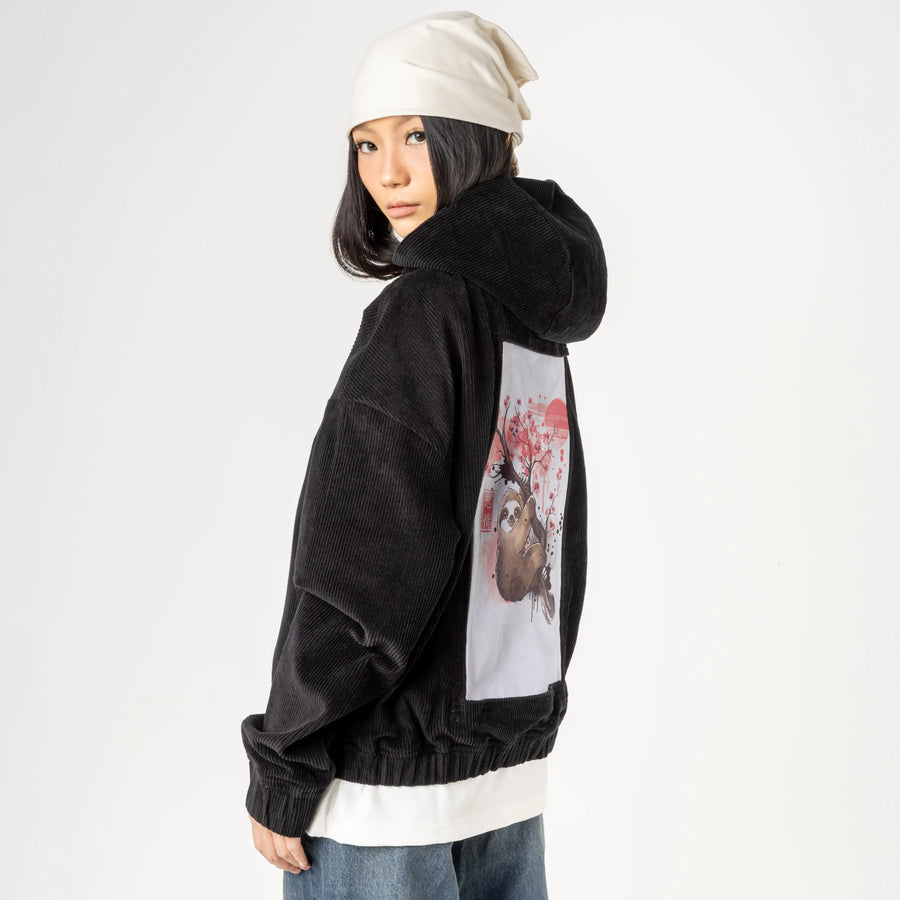sakurasloth patch on female retro cord hoodie in onyx