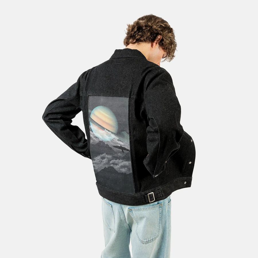 saturnabove patch on male og denim jacket in raven