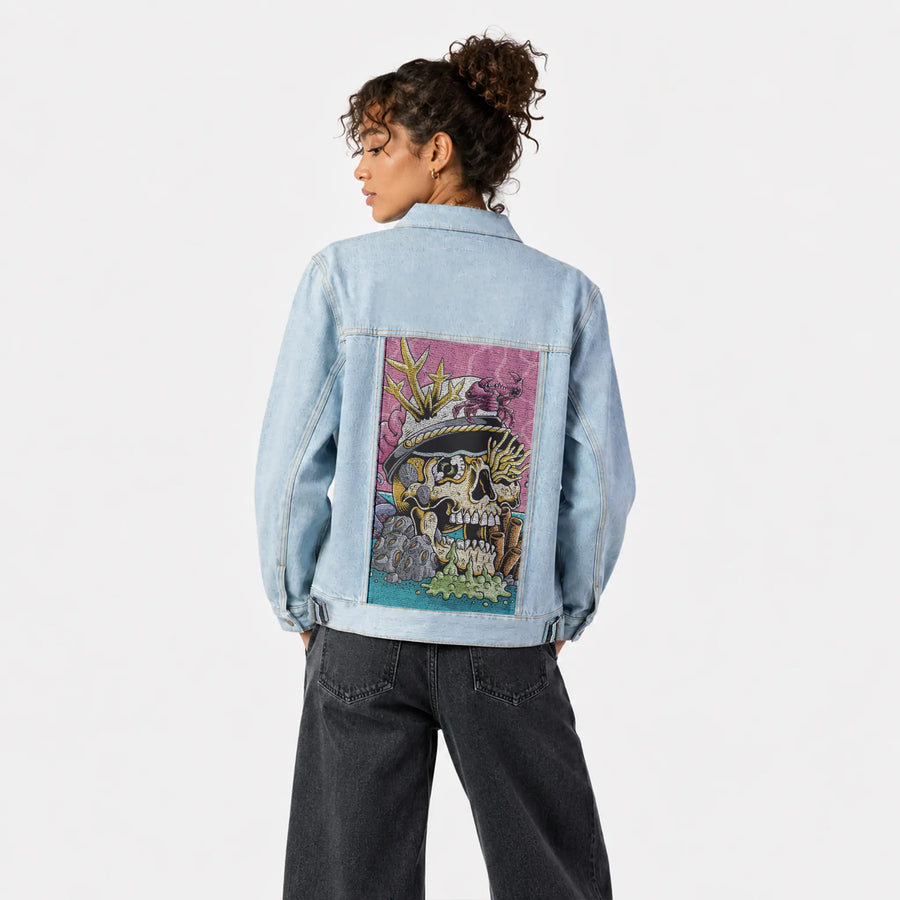 seastheday patch on female og denim jacket in oceanside