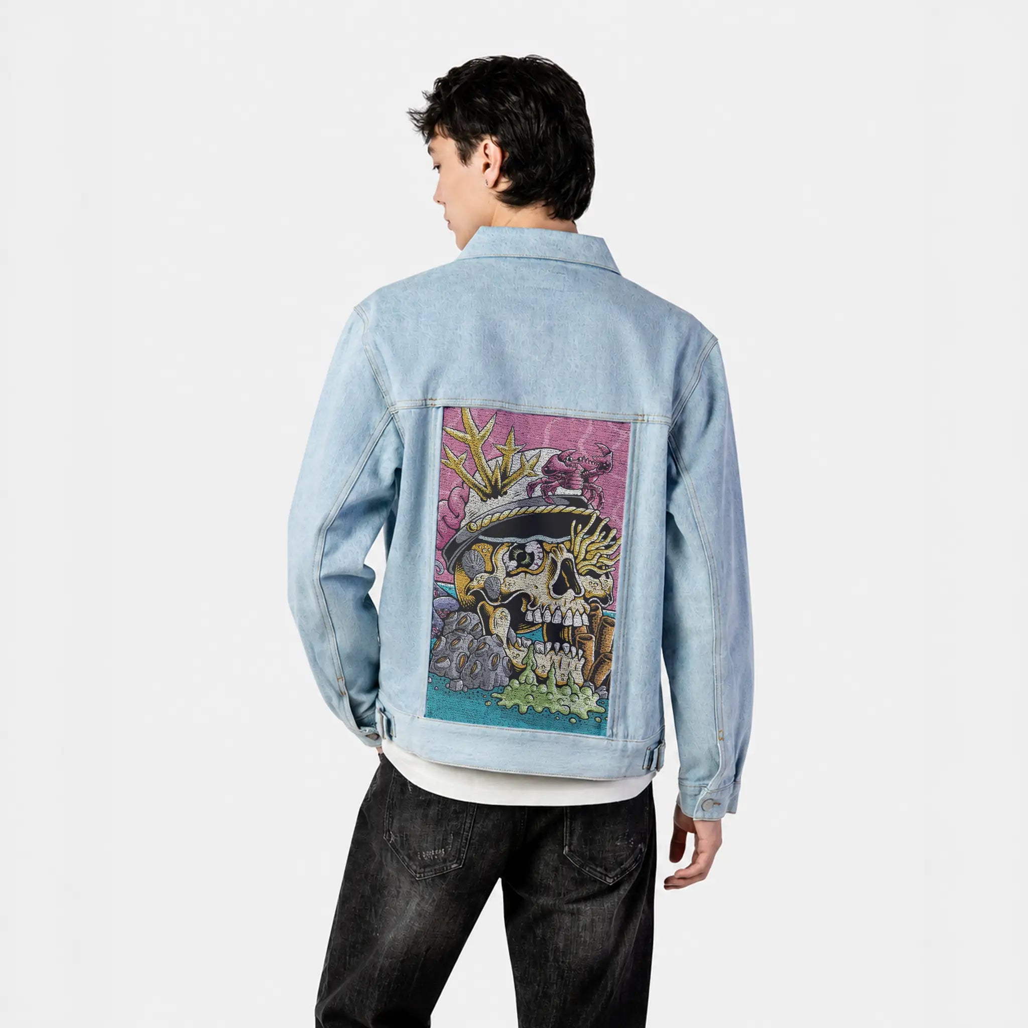 seastheday patch on male og denim jacket in oceanside