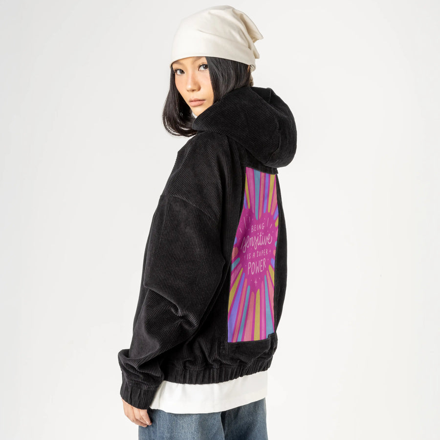 sensitive patch on female retro cord hoodie in onyx