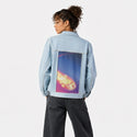 shootingstar patch on female og denim jacket in oceanside