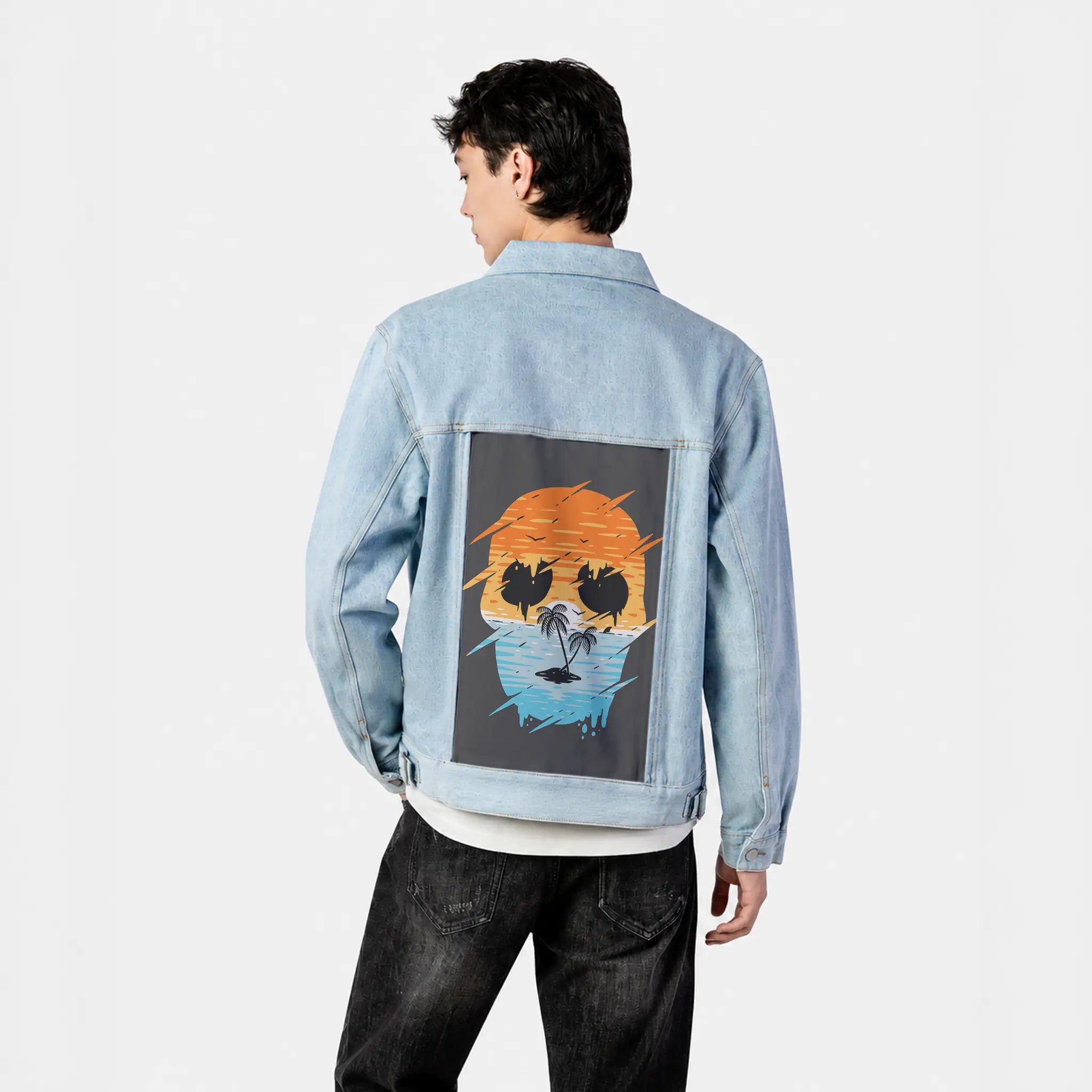 skullsunset patch on male og denim jacket in oceanside