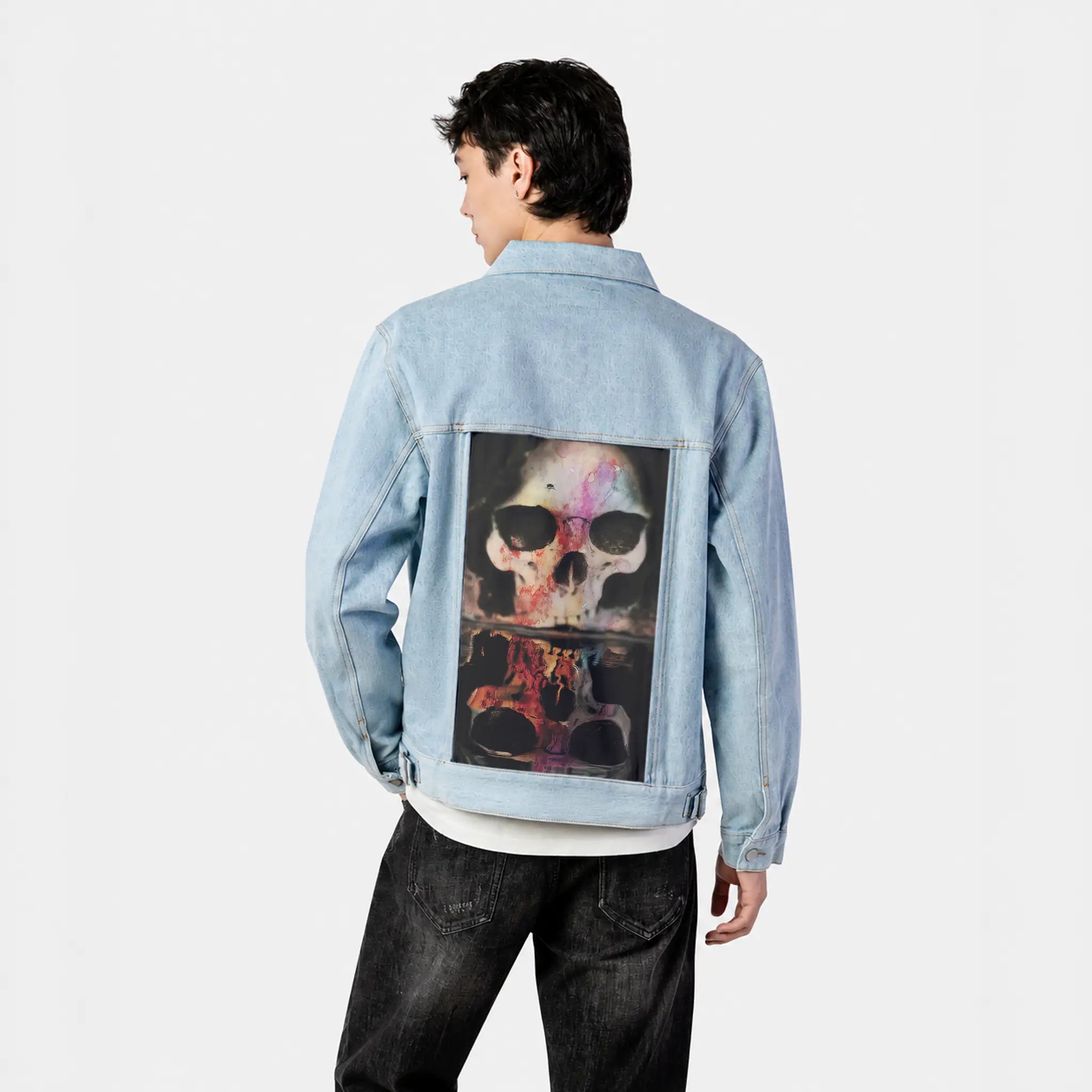 skullwithfly patch on male og denim jacket in oceanside