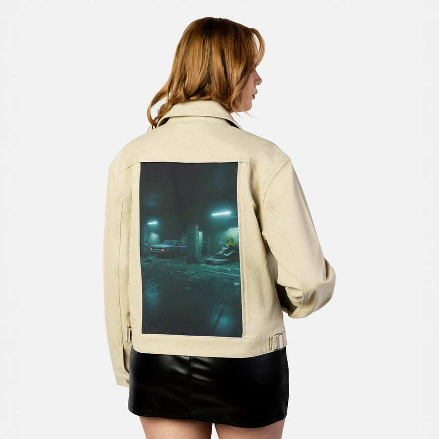 sneakyducky patch on female atelier canvas jacket in tan