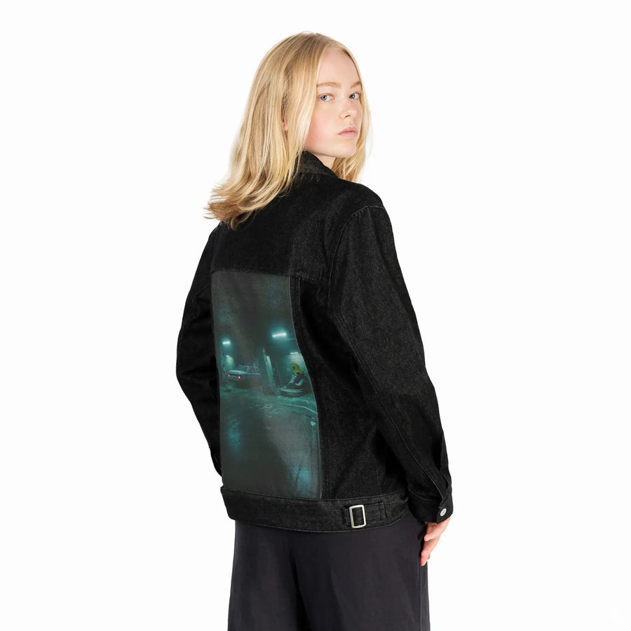 sneakyducky patch on female og denim jacket in raven