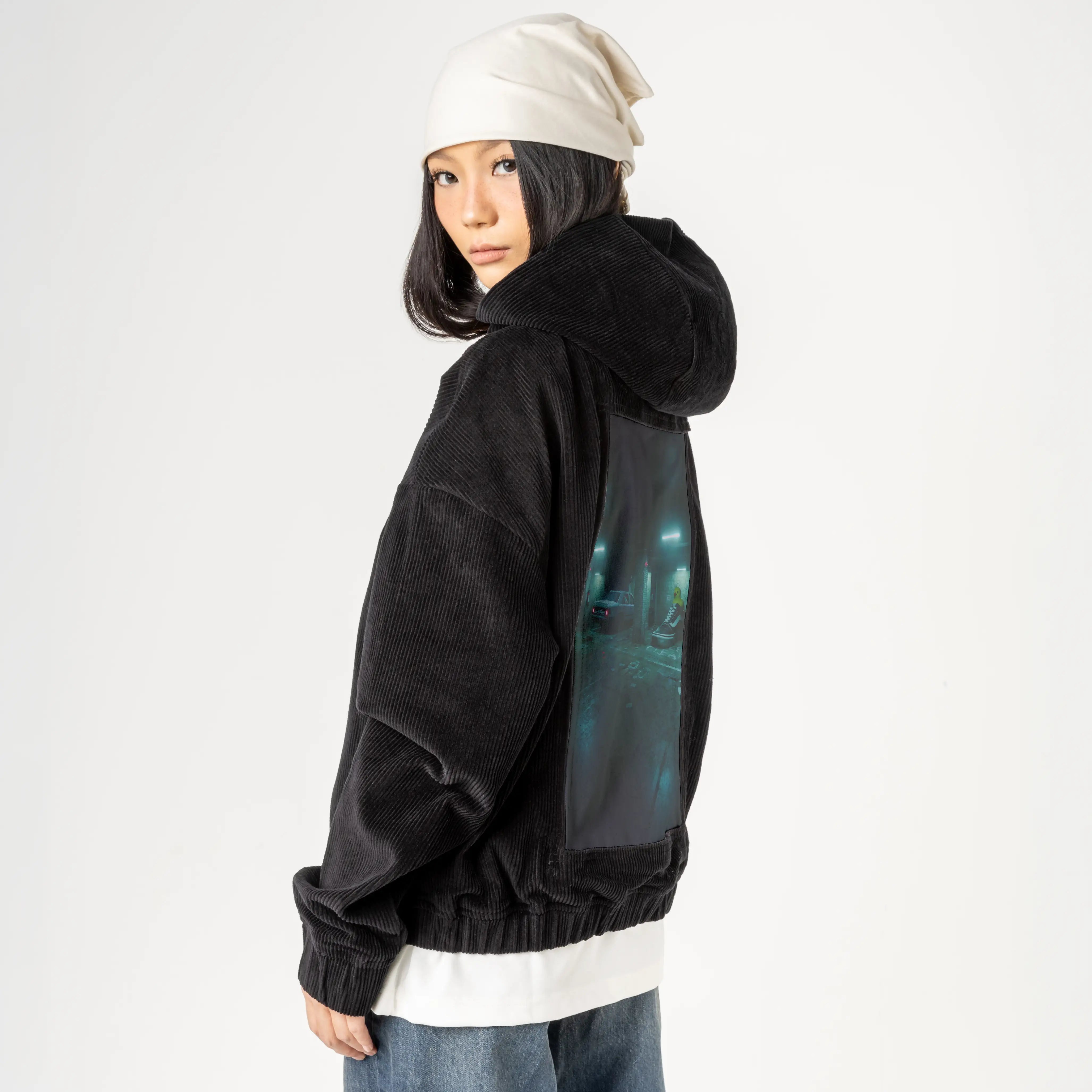 sneakyducky patch on female retro cord hoodie in onyx