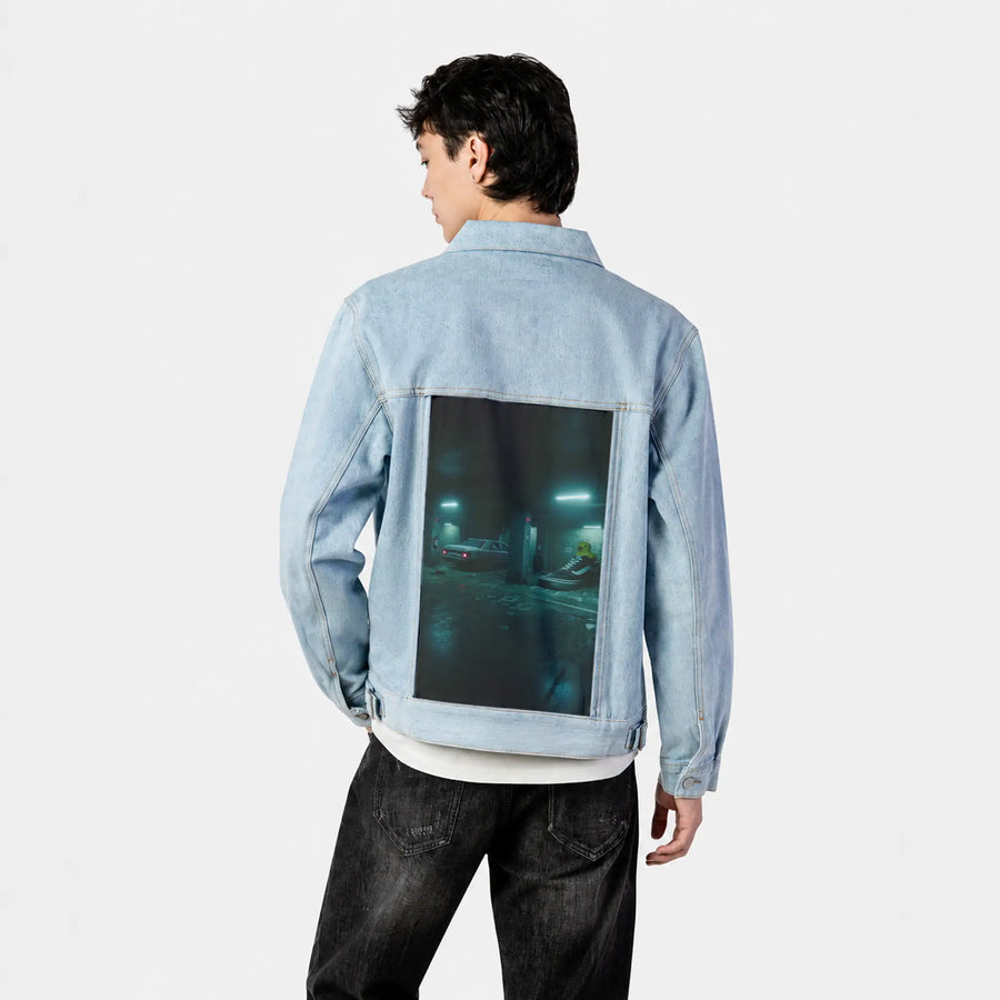 sneakyducky patch on male og denim jacket in oceanside
