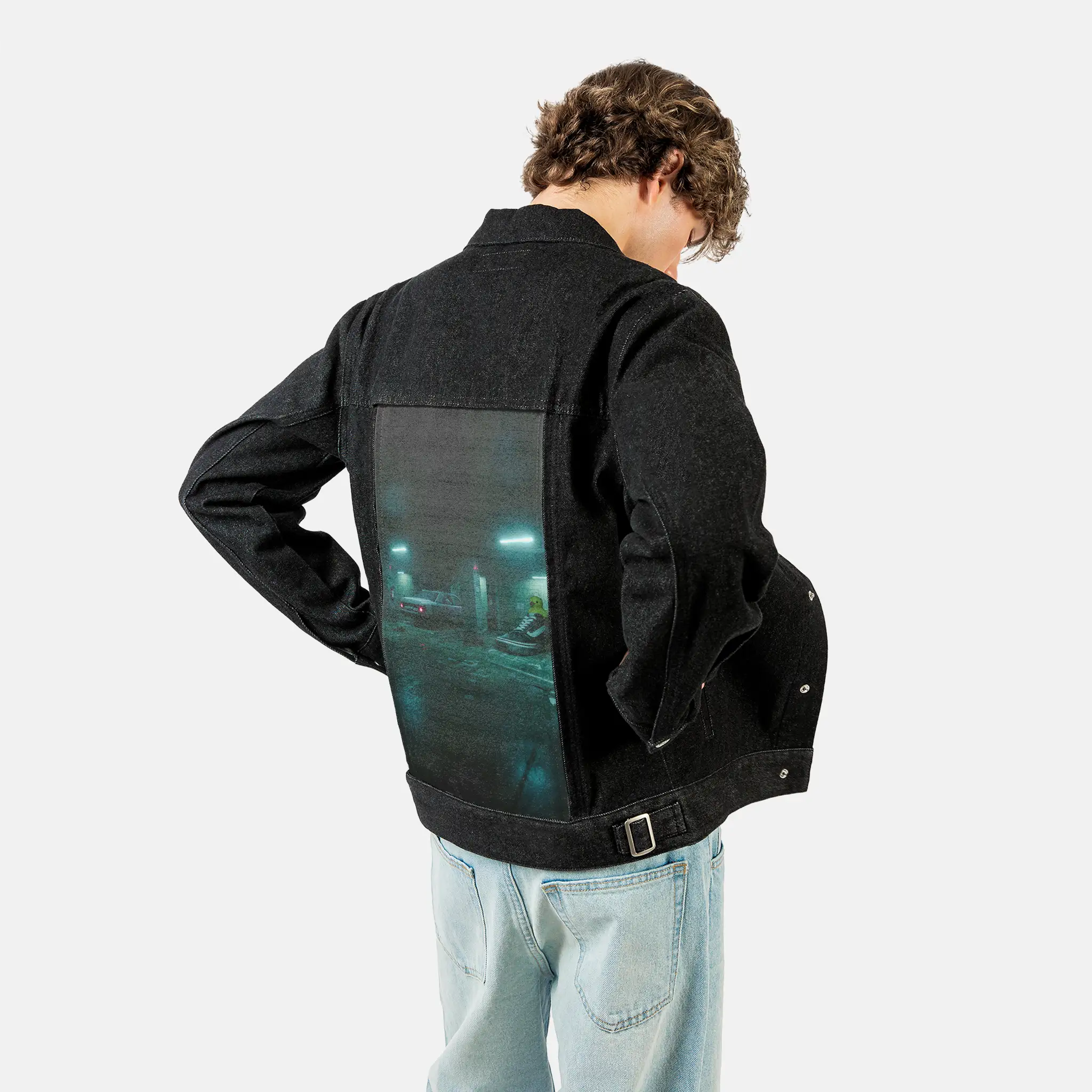 sneakyducky patch on male og denim jacket in raven