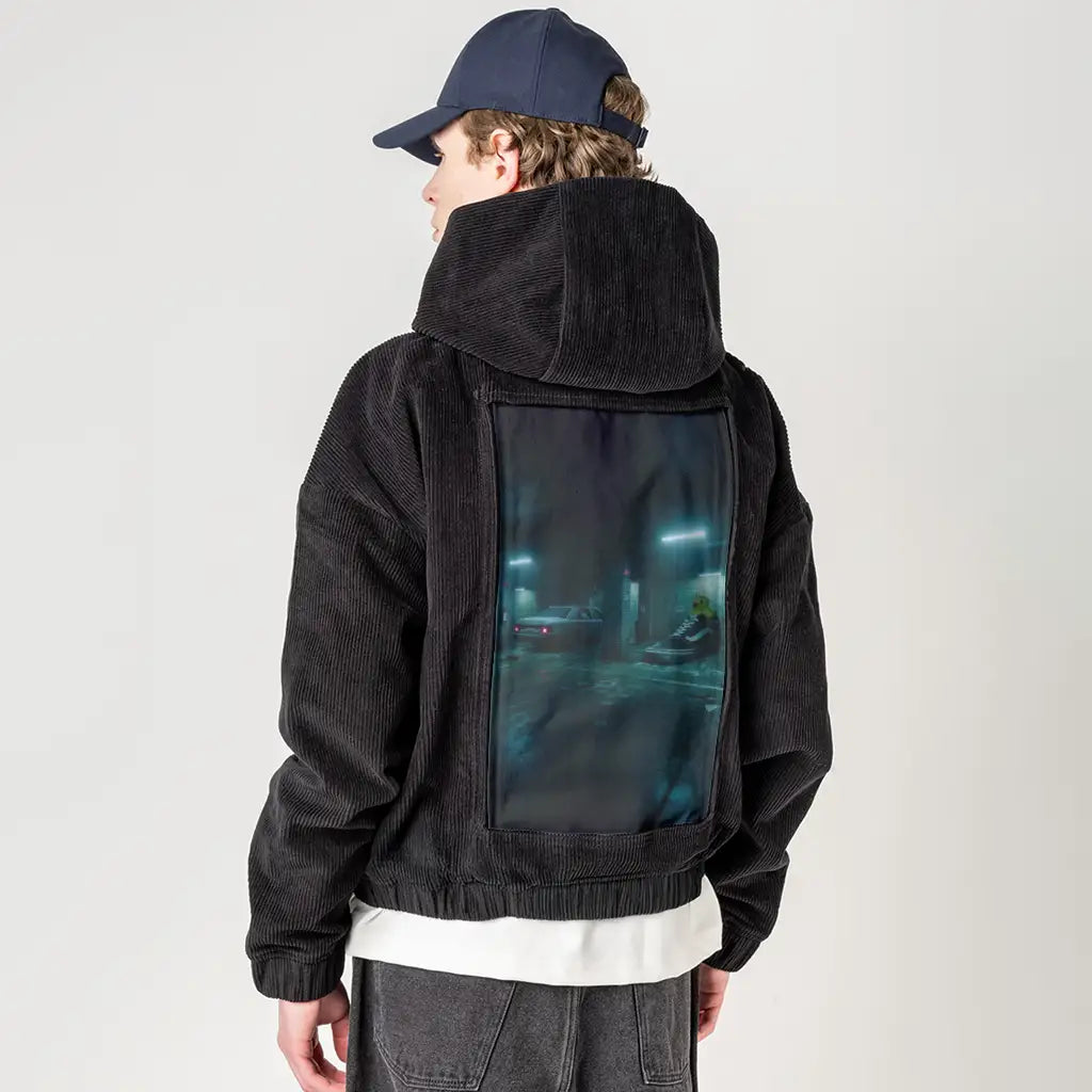 sneakyducky patch on male retro cord hoodie in onyx
