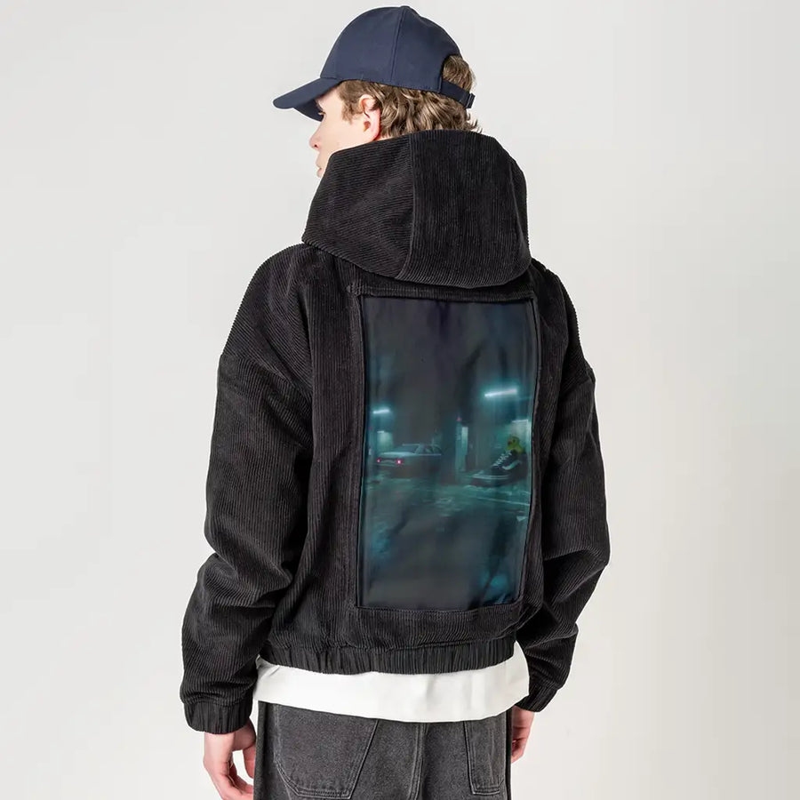 sneakyducky patch on male retro cord hoodie in onyx
