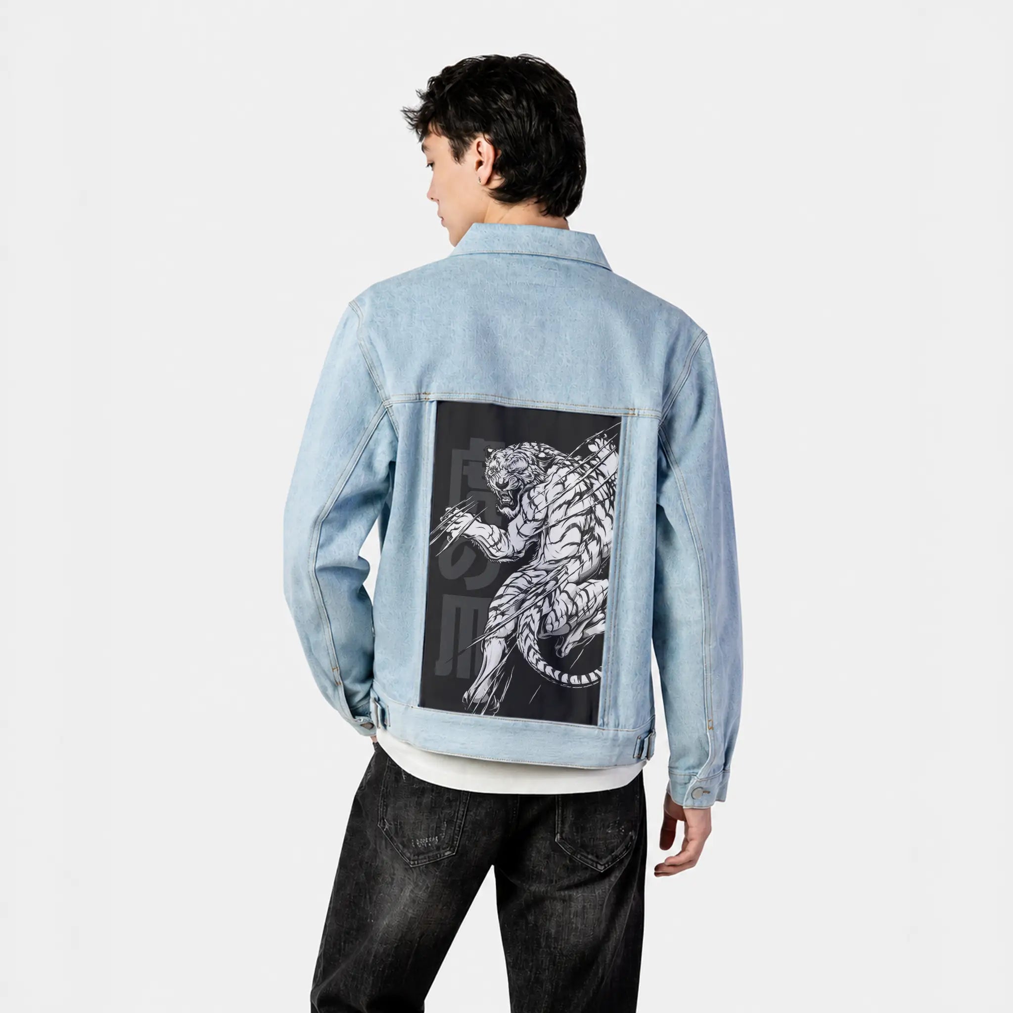 snowtiger patch on male og denim jacket in oceanside