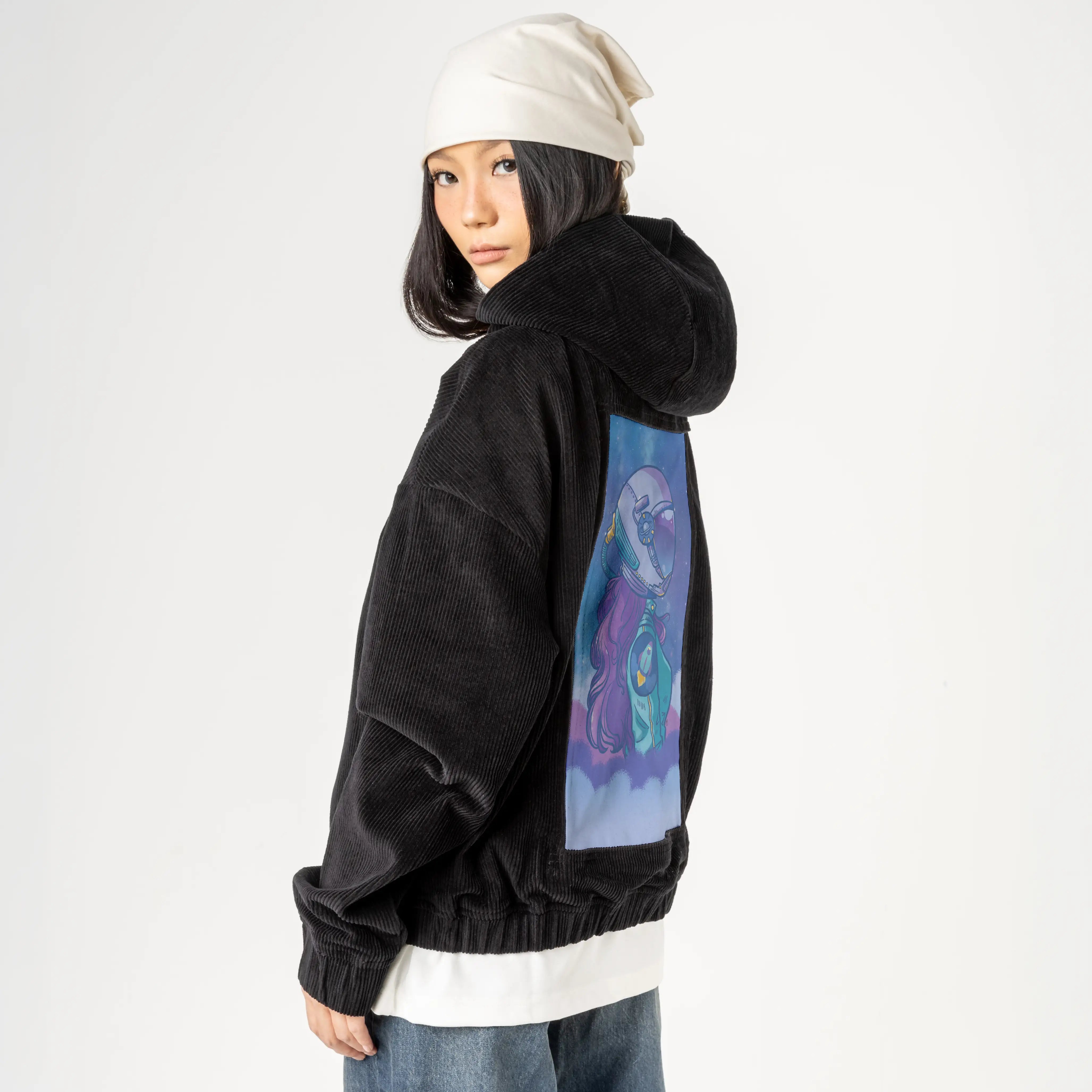 spacecase patch on female retro cord hoodie in onyx