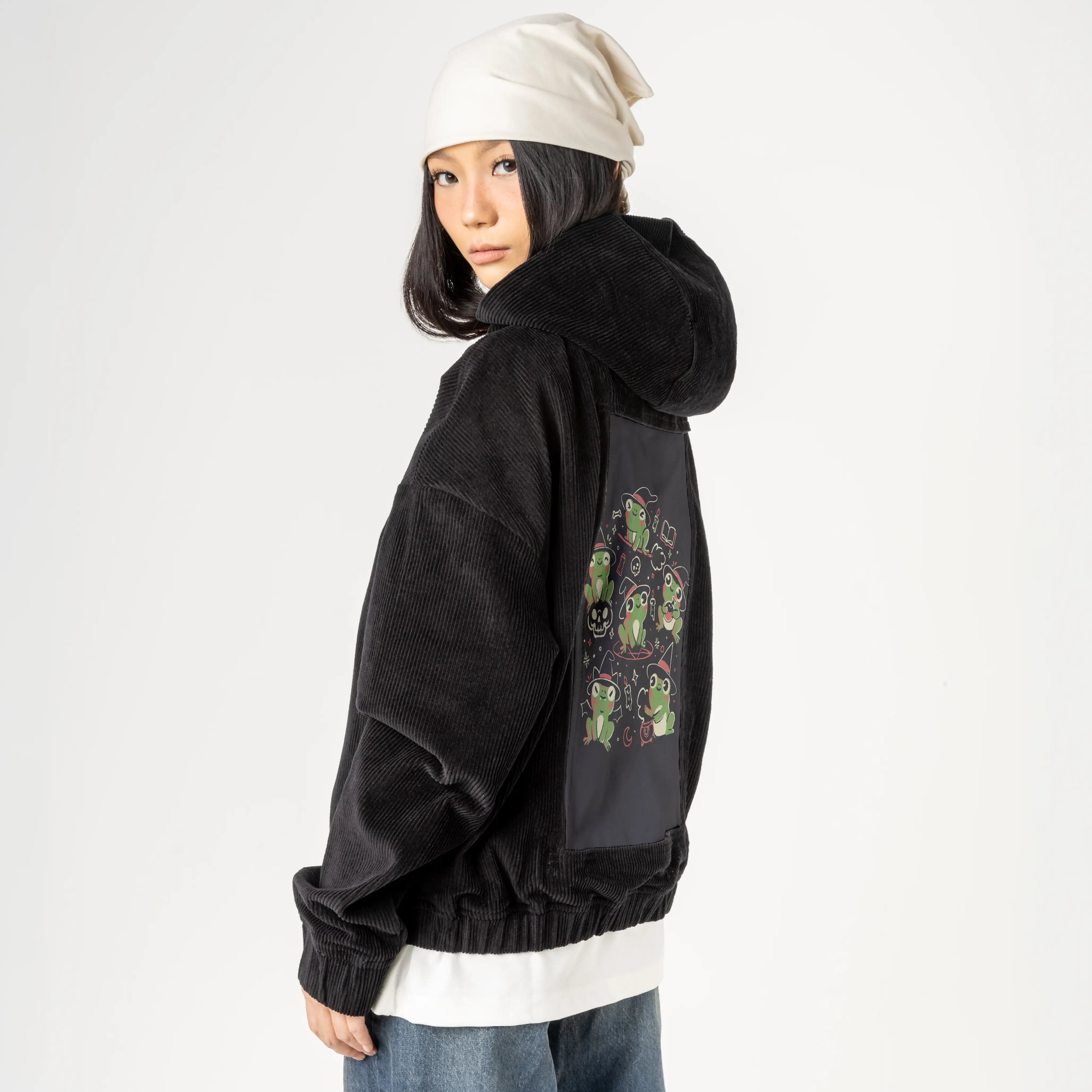 spookyfrogs patch on female retro cord hoodie in onyx