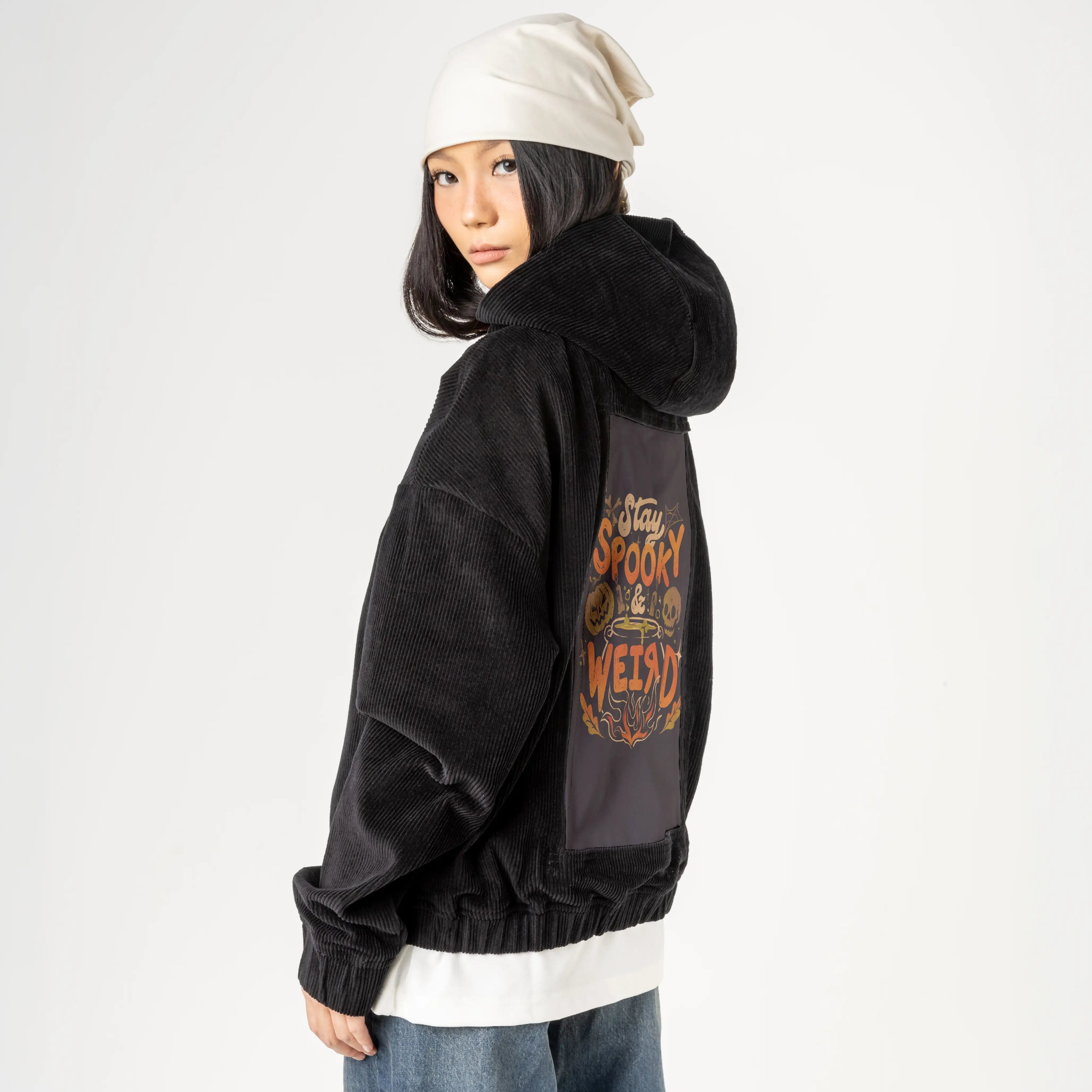spookyweird patch on female retro cord hoodie in onyx
