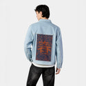 spring patch on male og denim jacket in oceanside