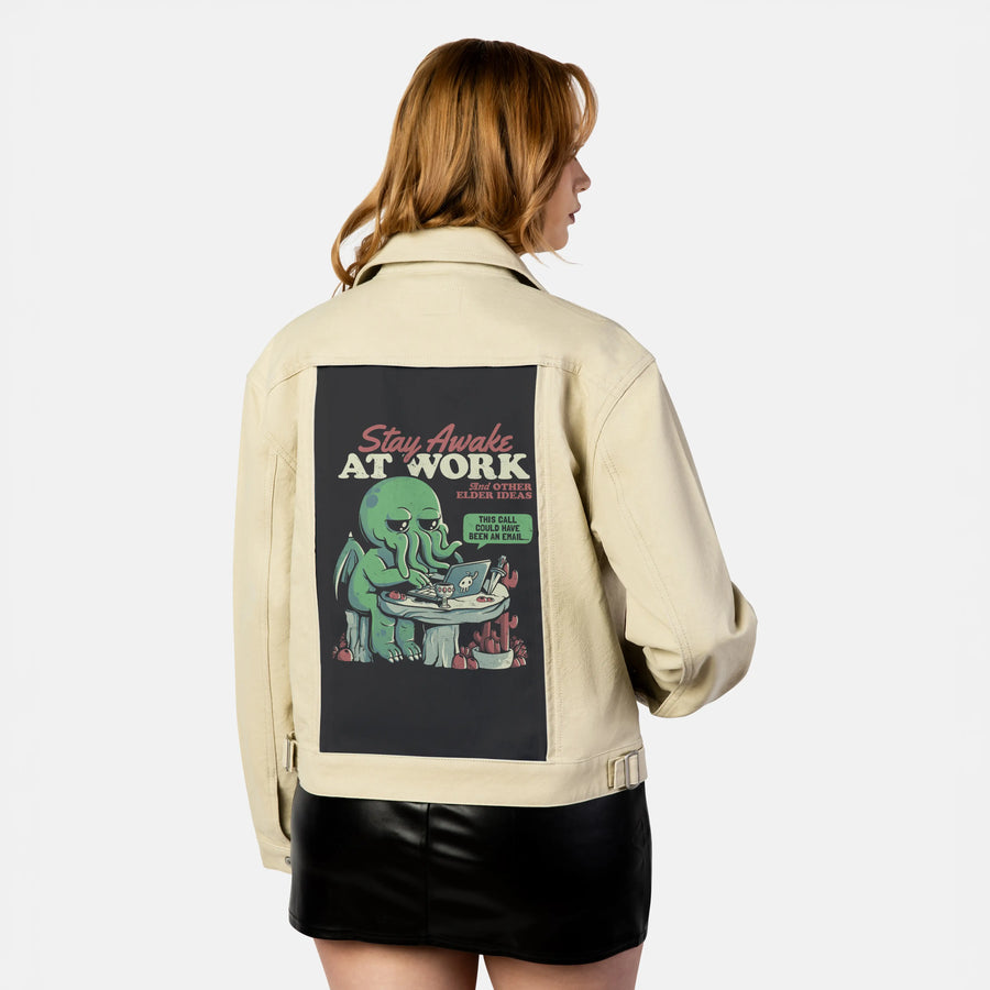 stayawakeatwork patch on female atelier canvas jacket in tan
