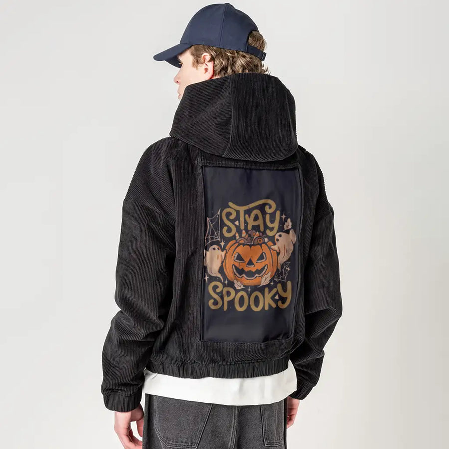 stayspooky patch on male retro cord hoodie in onyx