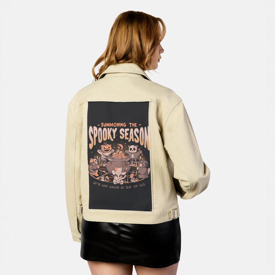 summonspookyseason patch on female atelier canvas jacket in tan