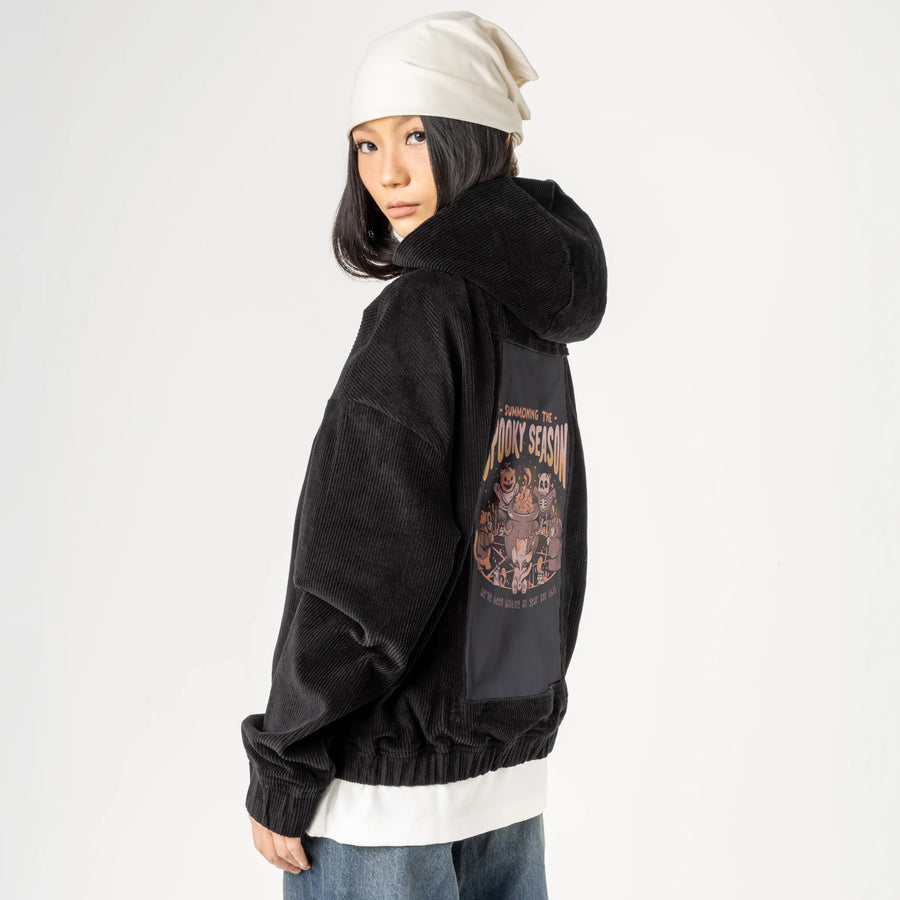 summonspookyseason patch on female retro cord hoodie in onyx