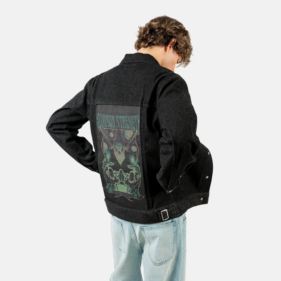 summonstrength patch on male og denim jacket in raven