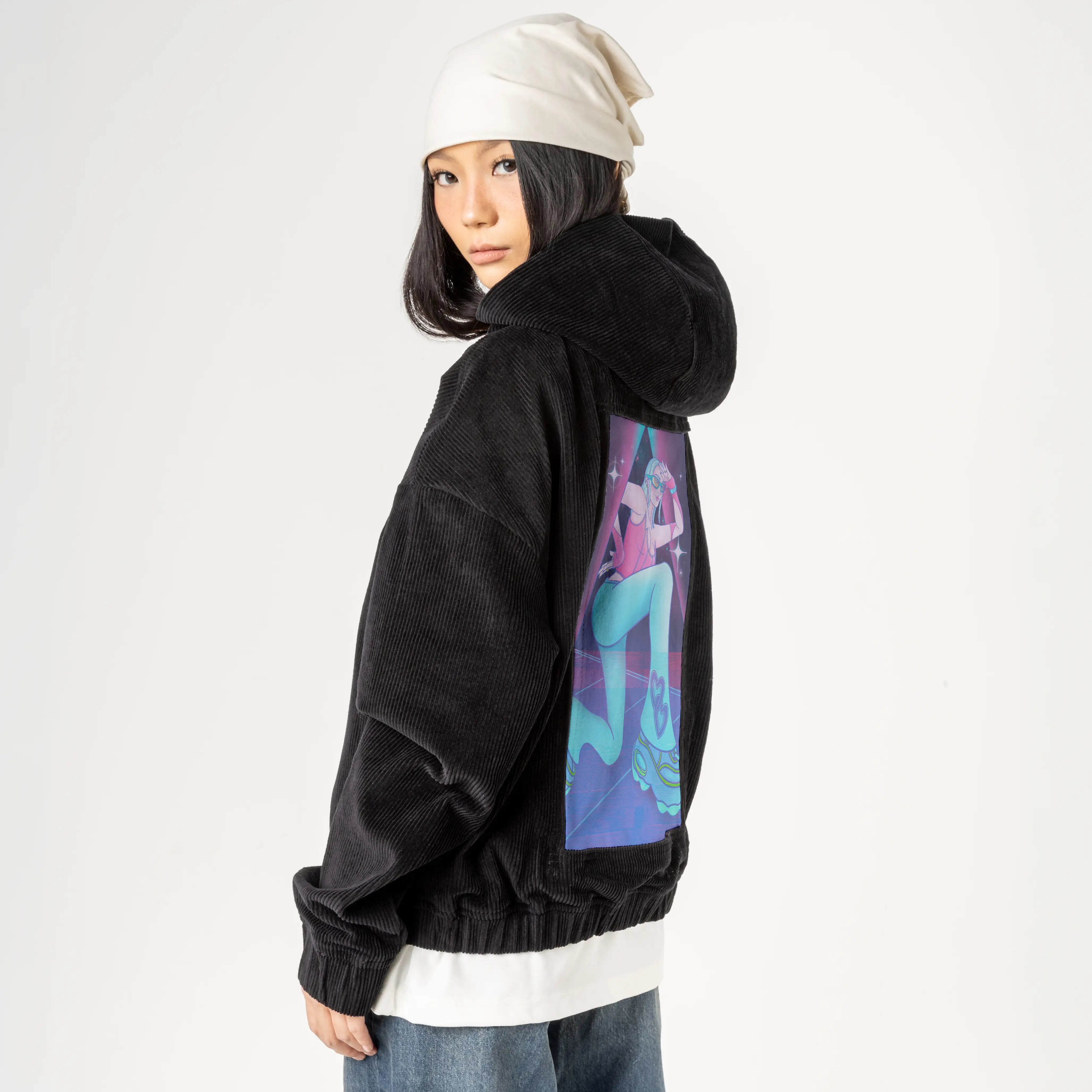 supernova patch on female retro cord hoodie in onyx
