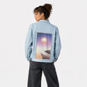 surrealjourneyhorizon patch on female og denim jacket in oceanside