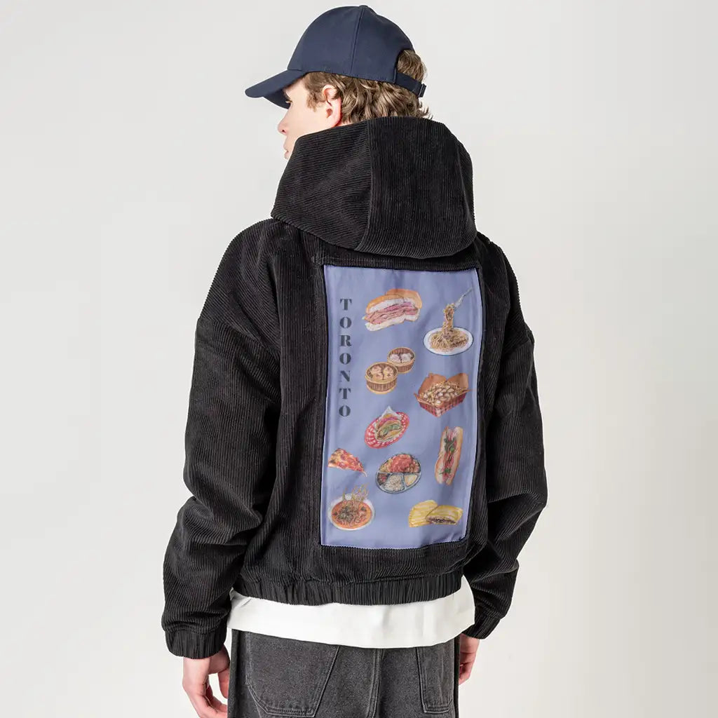 tasteoftoronto patch on male retro cord hoodie in onyx