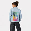technicolorastro patch on female og denim jacket in oceanside