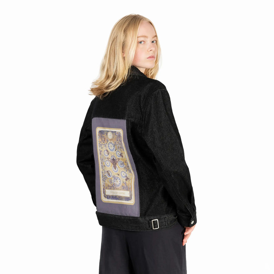 tenofcoins patch on female og denim jacket in raven